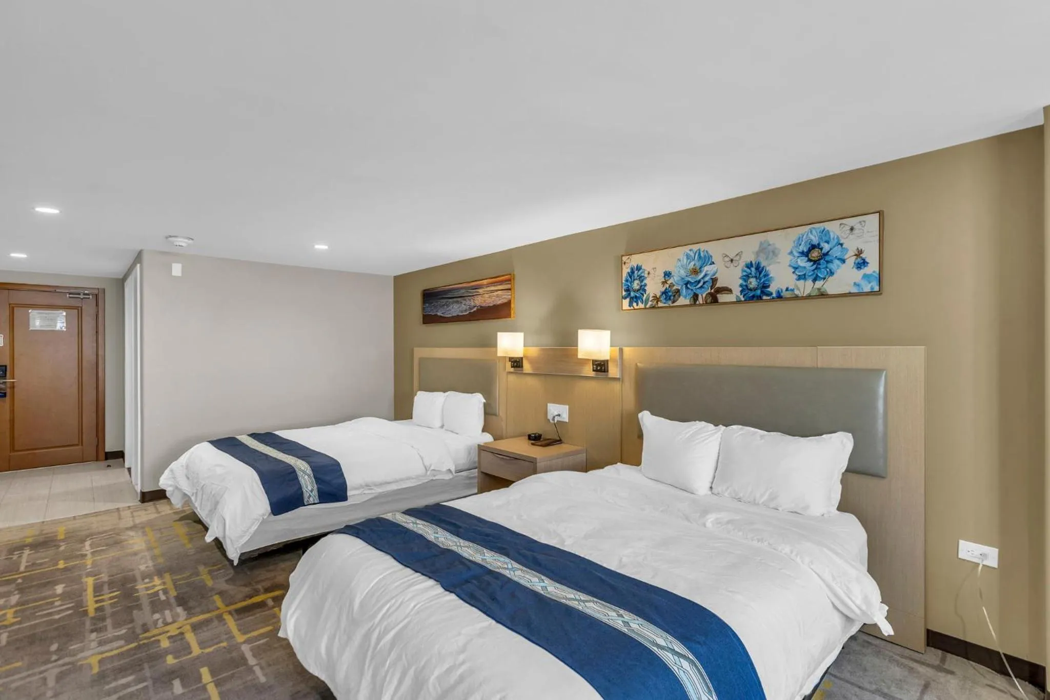 Bed in KC Inn Hotel Kansas City