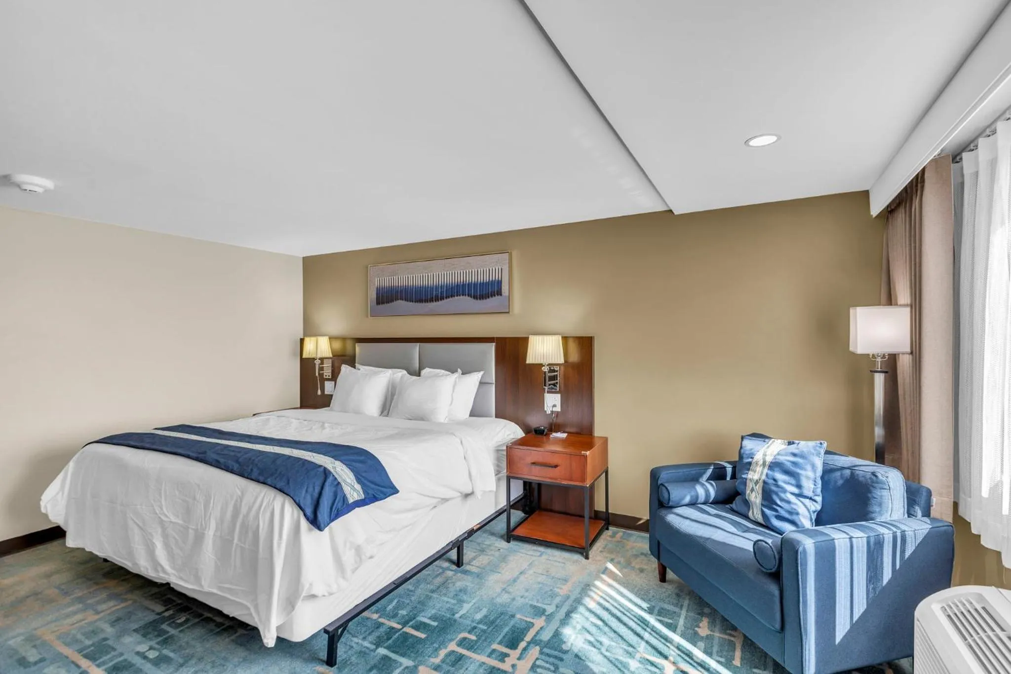 Bed in KC Inn Hotel Kansas City