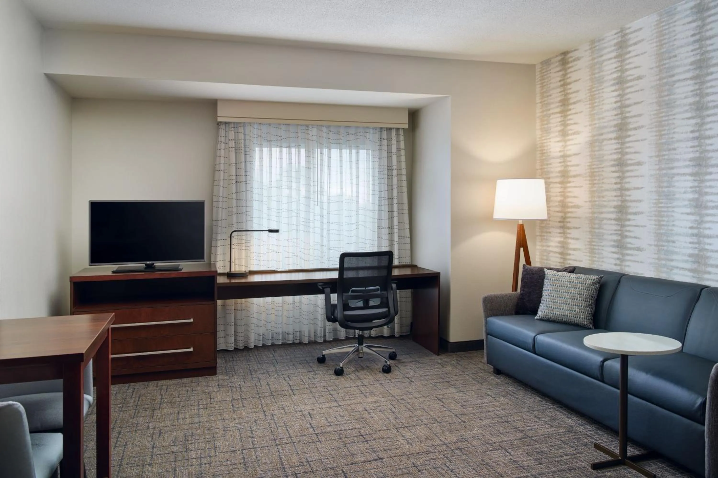 Living room in Residence Inn by Marriott Fort Myers at I-75 and Gulf Coast Town Center
