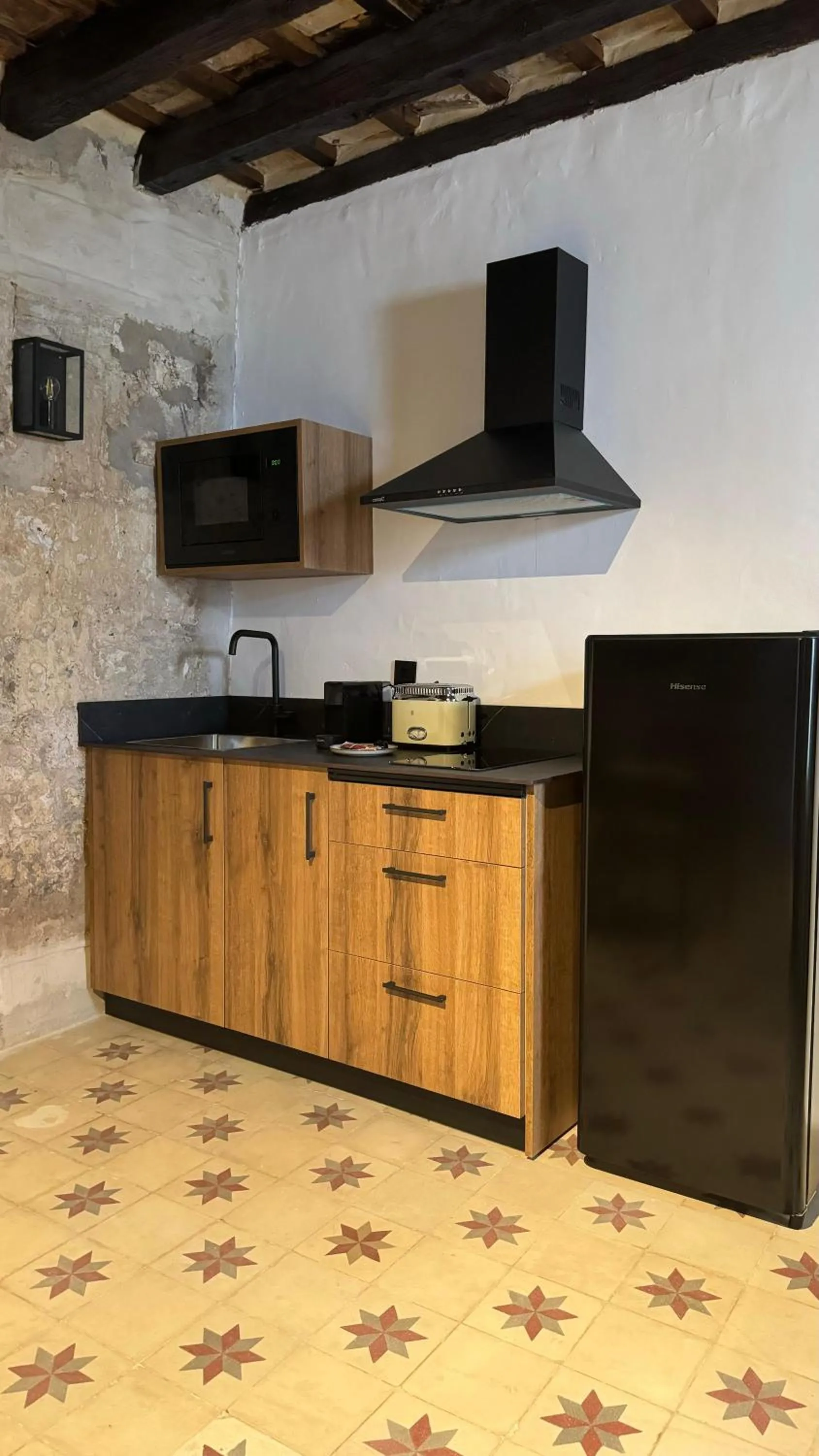 Kitchen or kitchenette in Apartamentos Jerez Siglo XIX