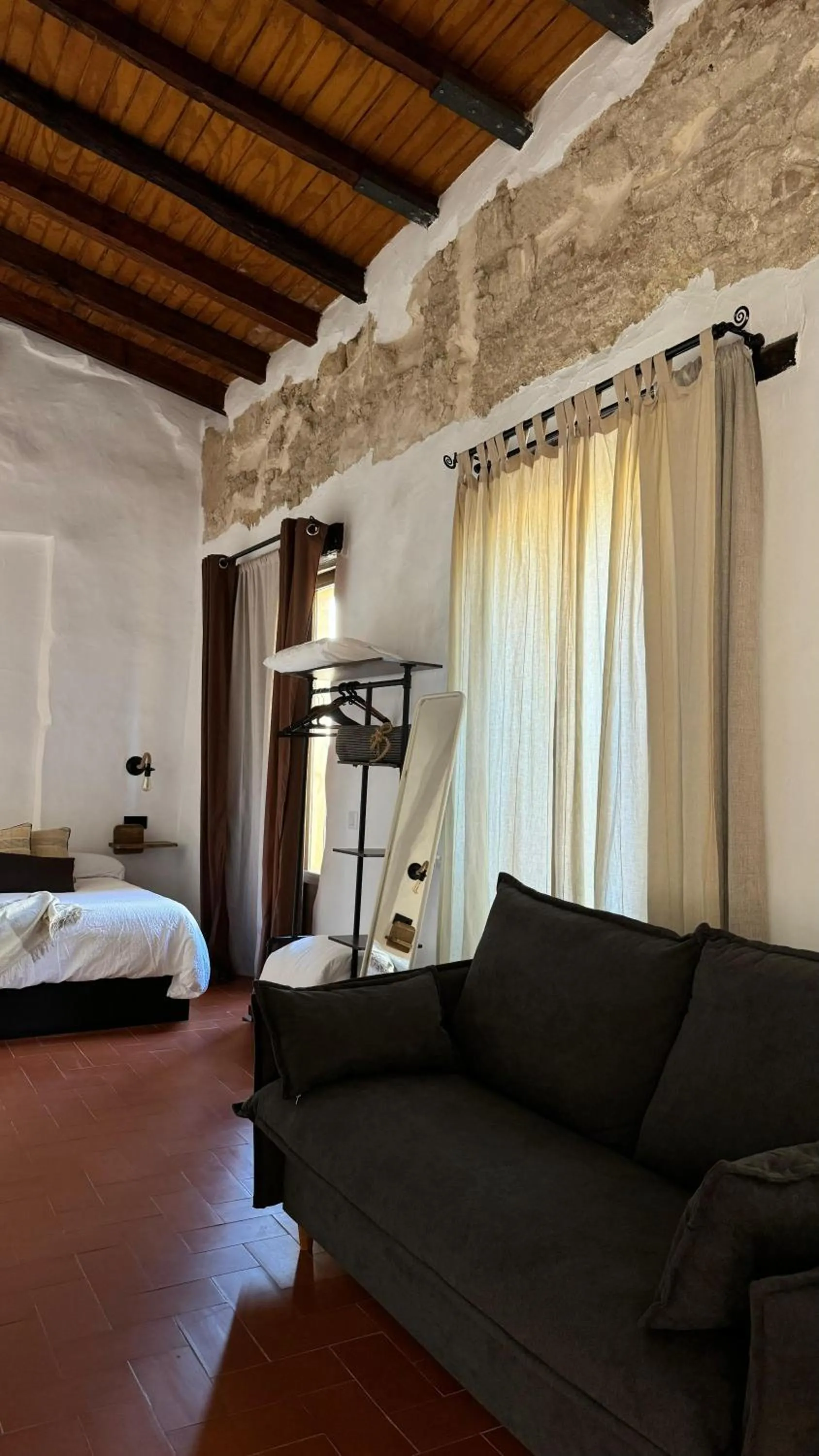 Living room, Bed in Apartamentos Jerez Siglo XIX