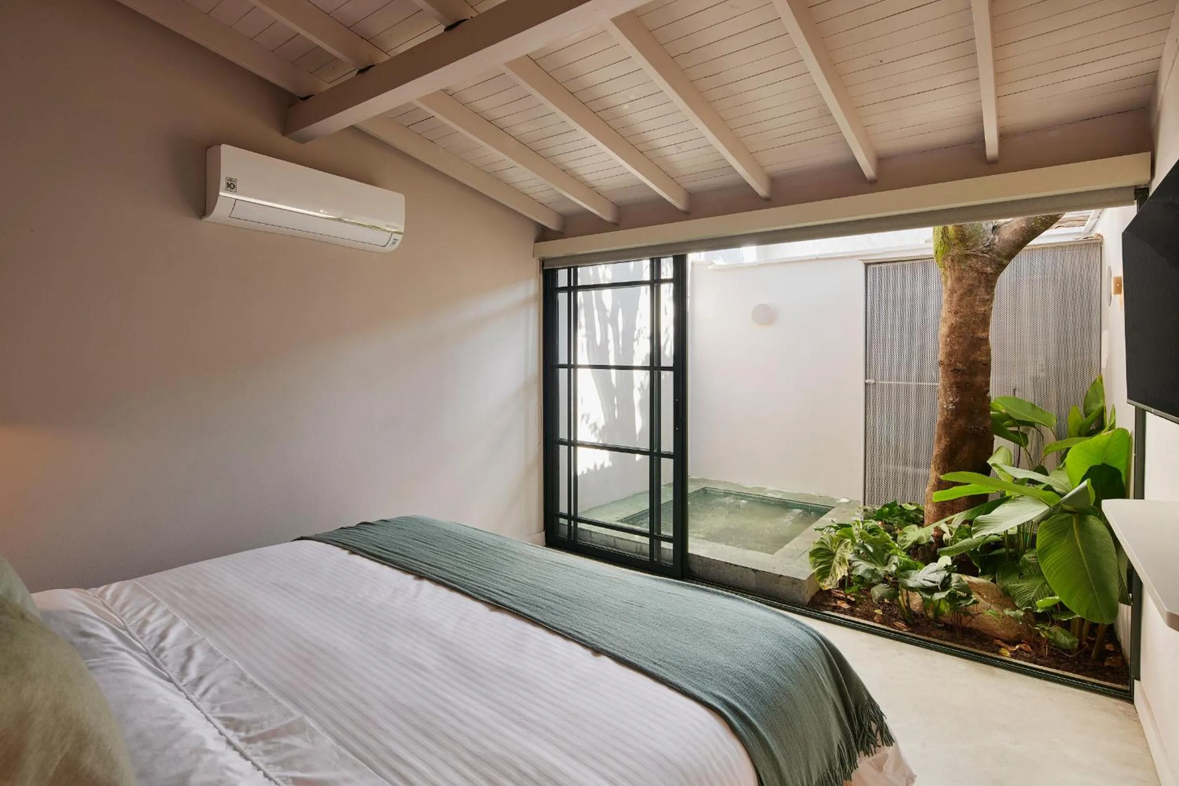 Bed in Antipoda Hotel Boutique