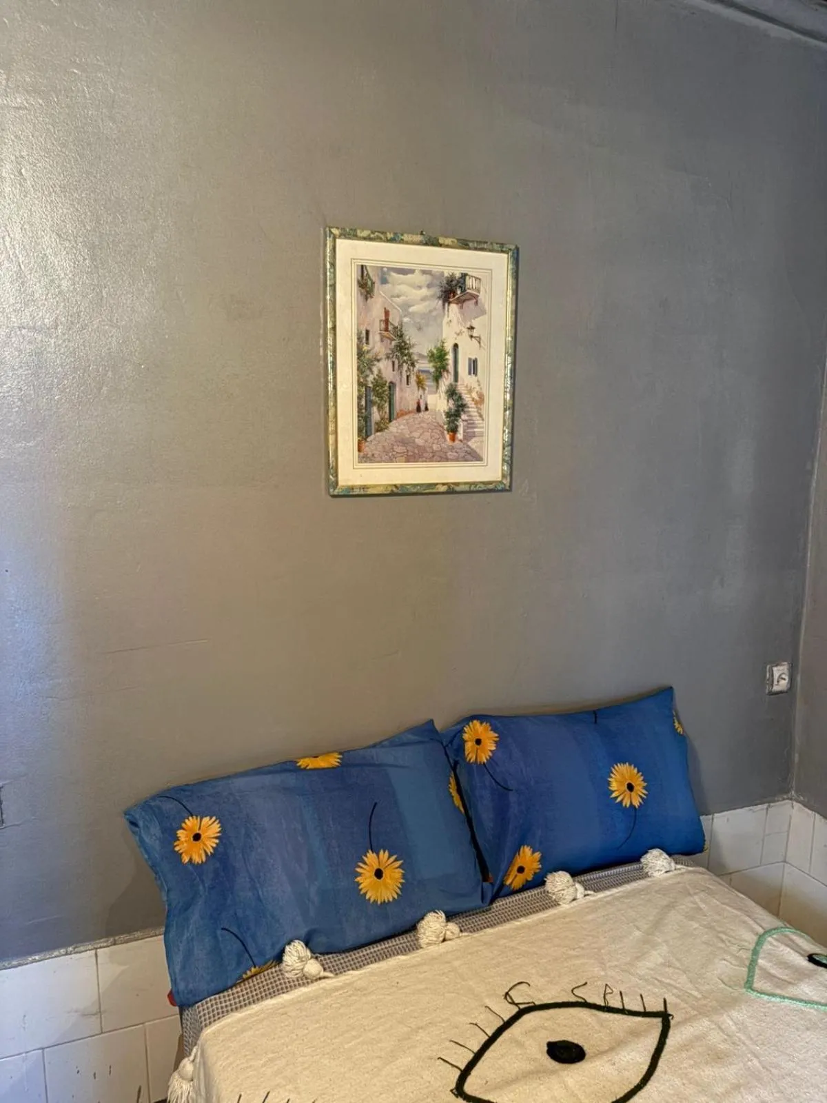 Bed in ASARAG GUEST HOUSE, YOGA & Surf