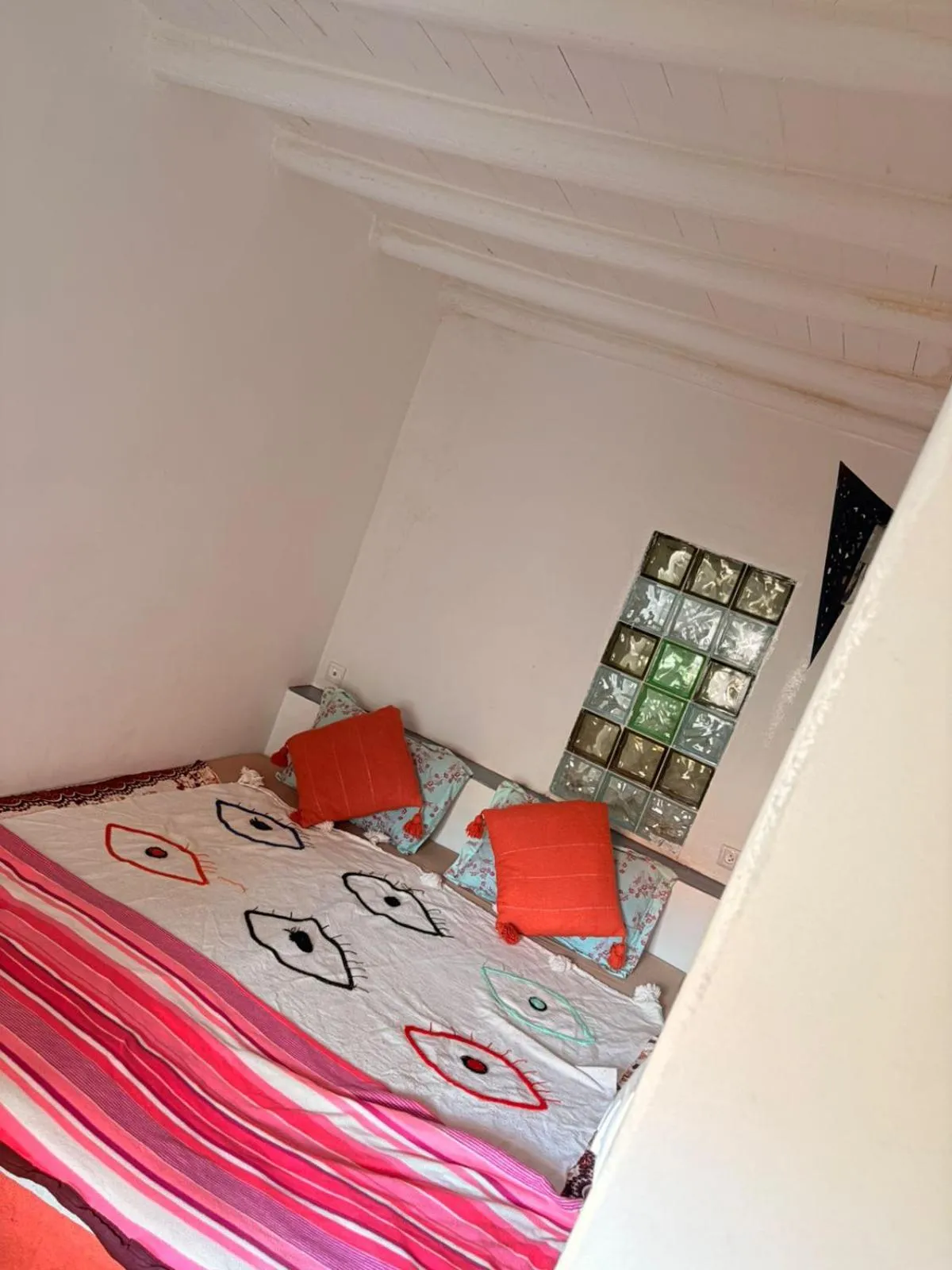 Bed in ASARAG GUEST HOUSE, YOGA & Surf