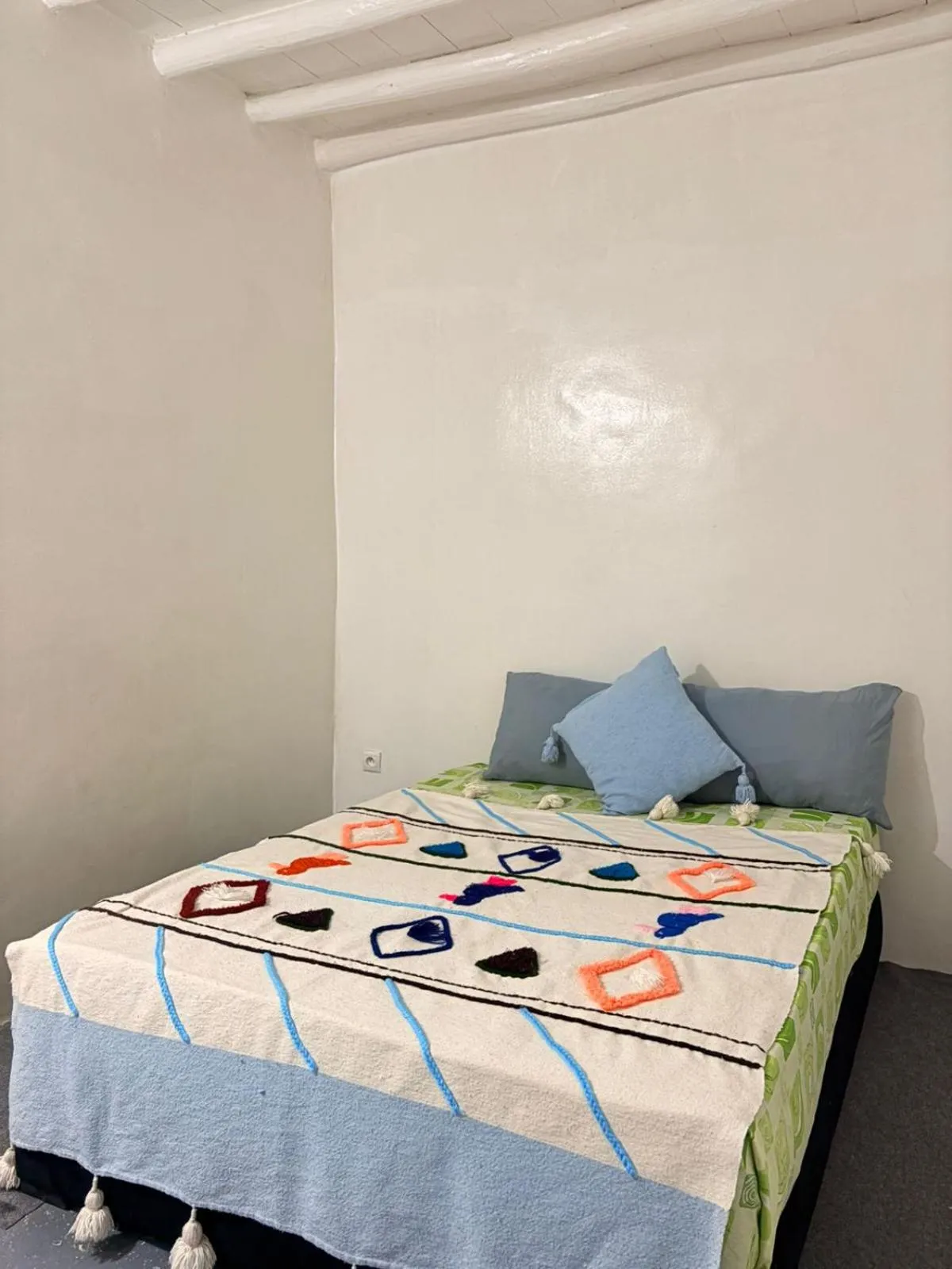 Bed in ASARAG GUEST HOUSE, YOGA & Surf