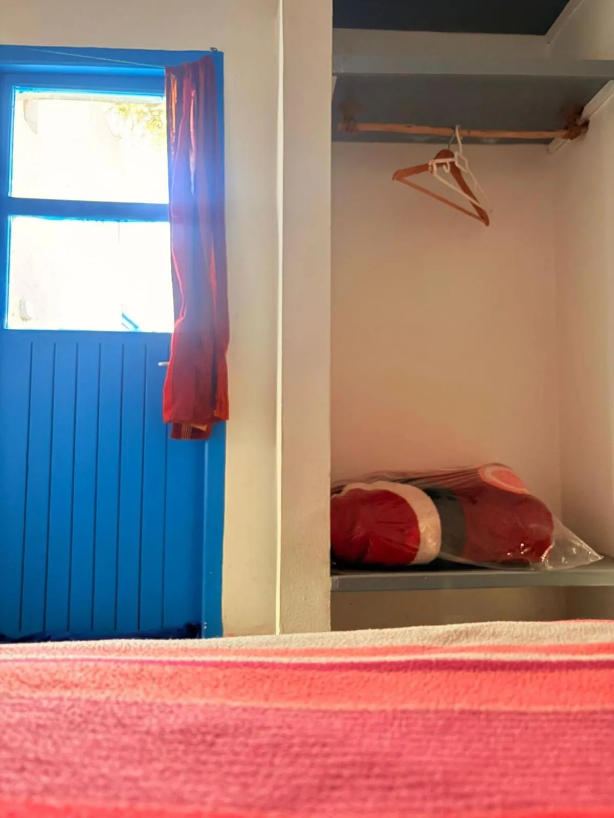 Bed in ASARAG GUEST HOUSE, YOGA & Surf