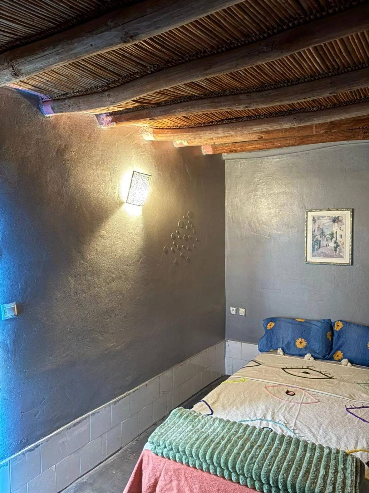Bed in ASARAG GUEST HOUSE, YOGA & Surf