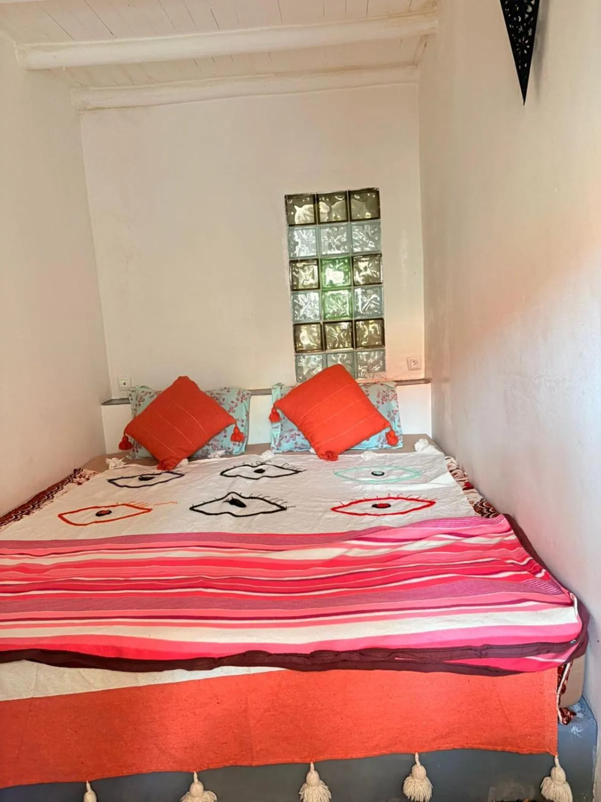 Bed in ASARAG GUEST HOUSE, YOGA & Surf
