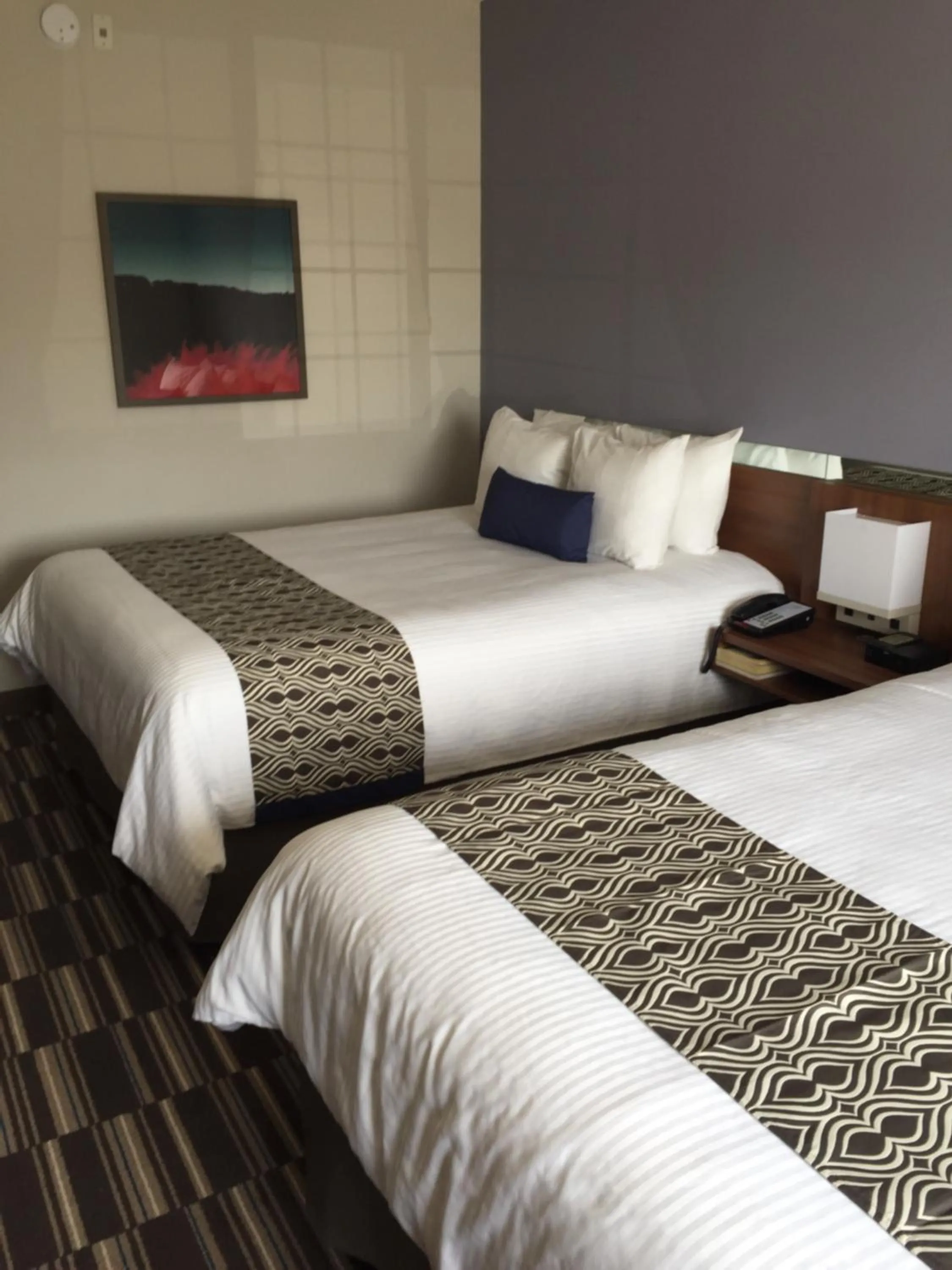 Decorative detail, Bed in Microtel Inn & Suites Sault Ste. Marie