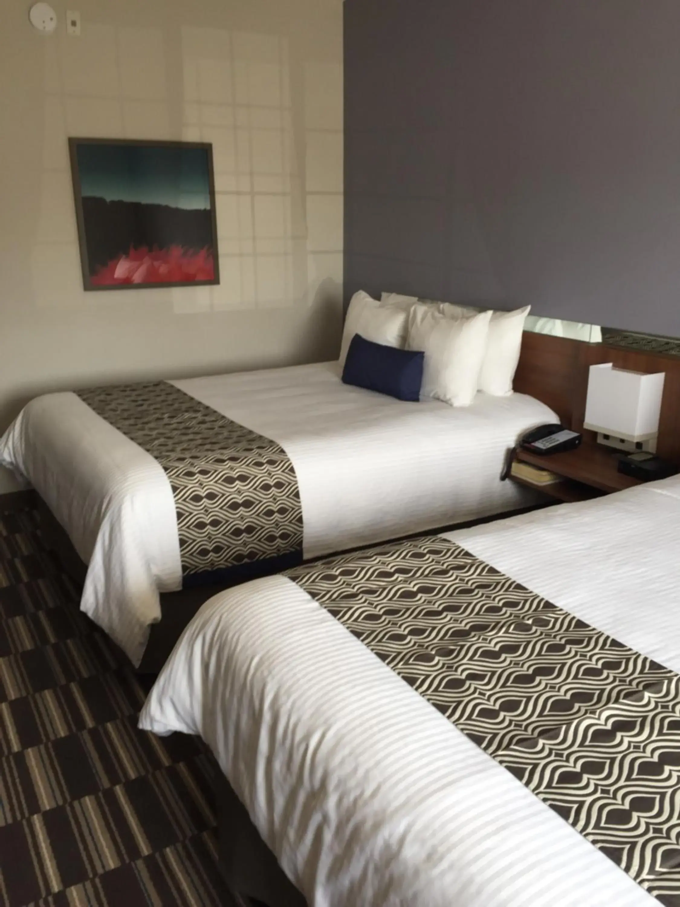 Decorative detail, Bed in Microtel Inn & Suites Sault Ste. Marie Decorative detail, Bed in Microtel Inn & Suites Sault Ste. Marie