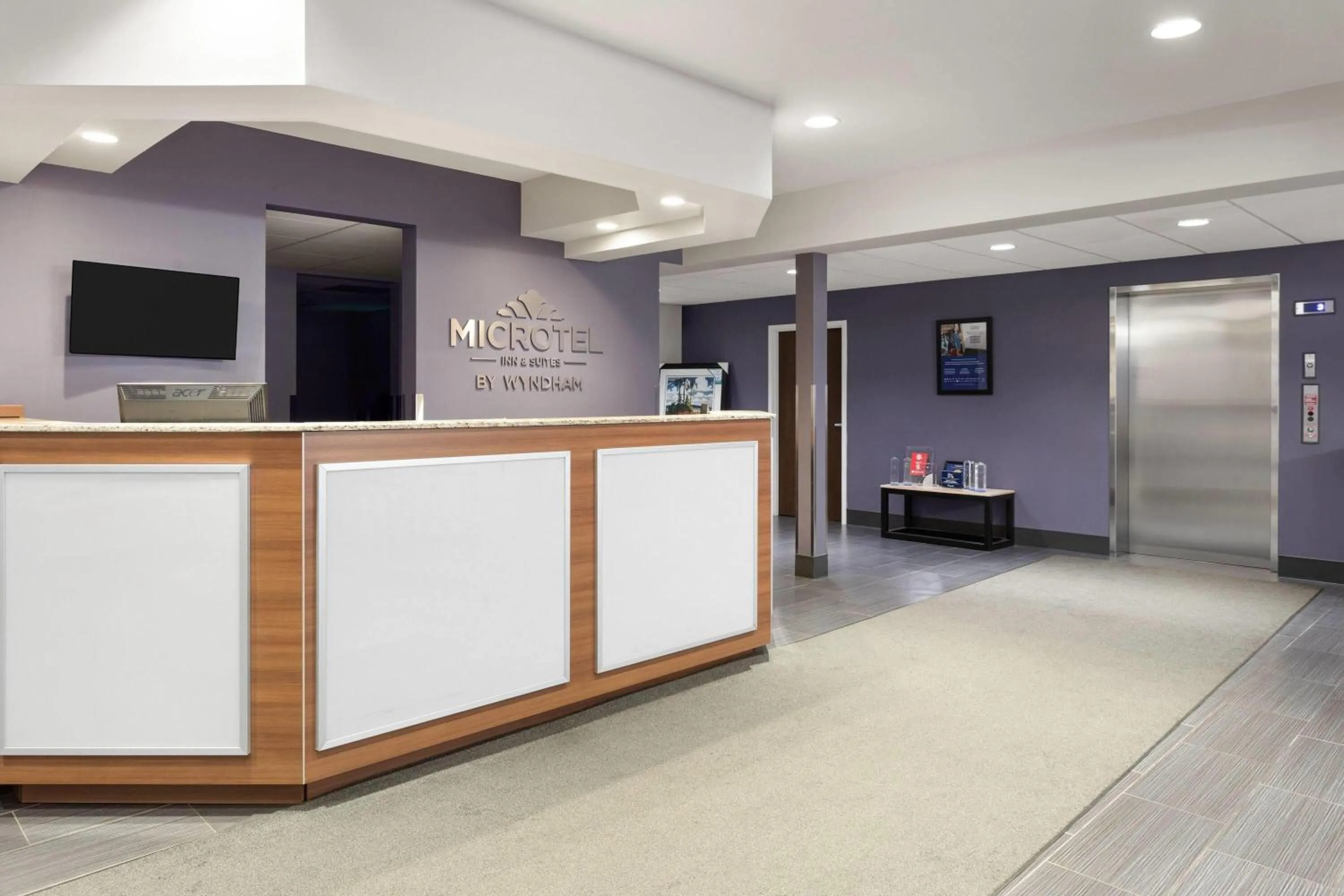 Lobby or reception in Microtel Inn & Suites Sault Ste. Marie