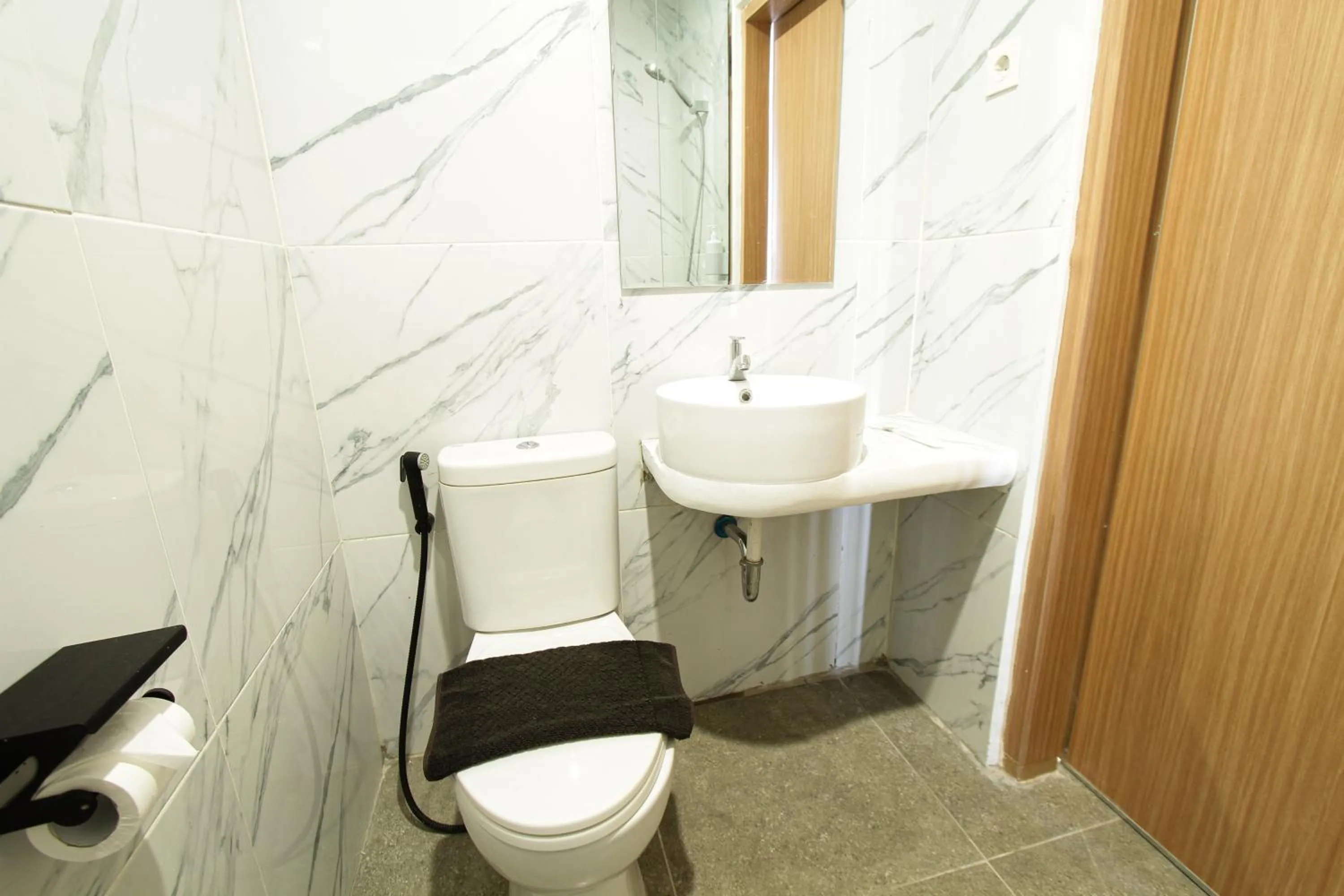 Toilet in Sepanak Hotel by Amazing