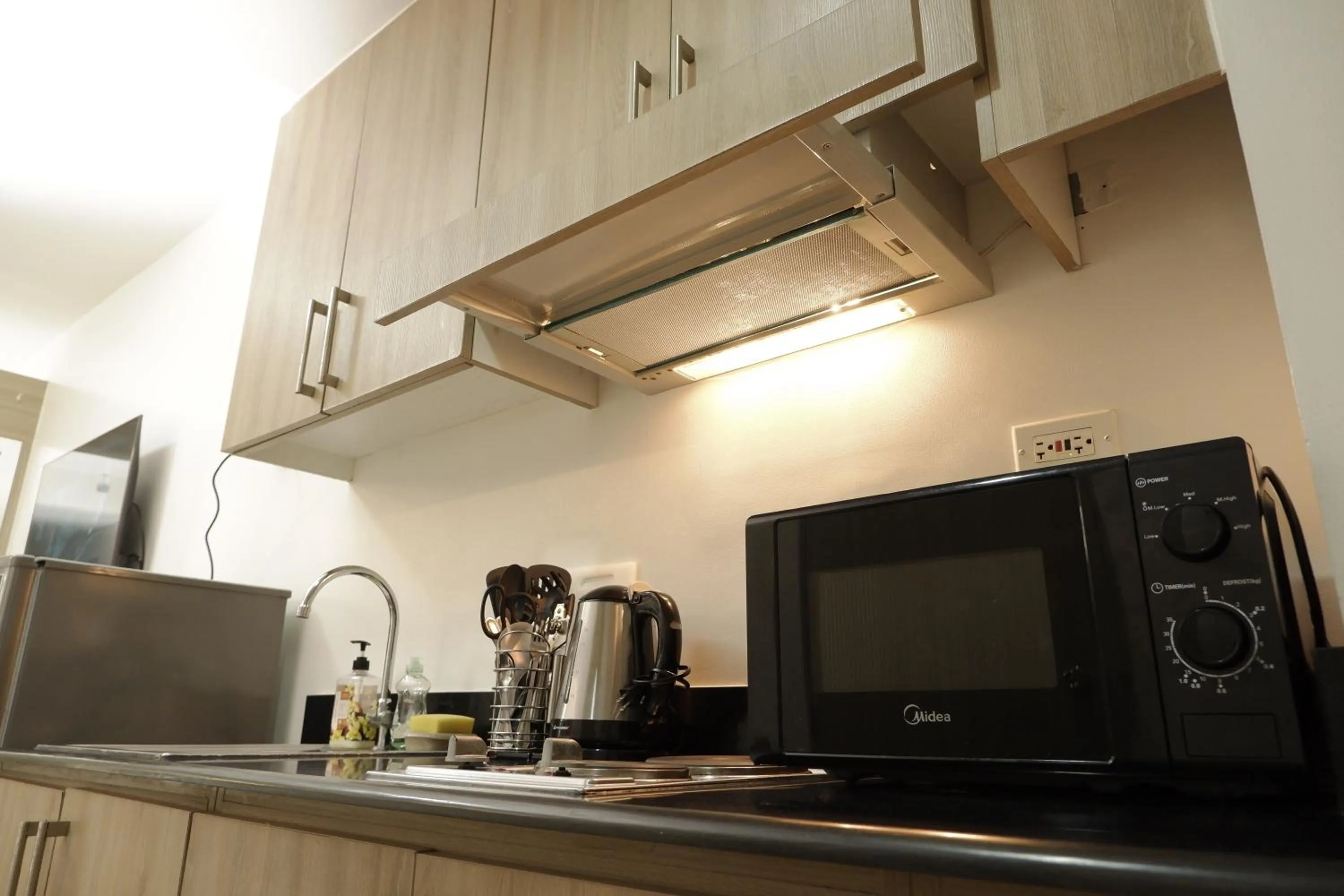 Kitchen or kitchenette in Shore Residences MOA Dynastel Staycation