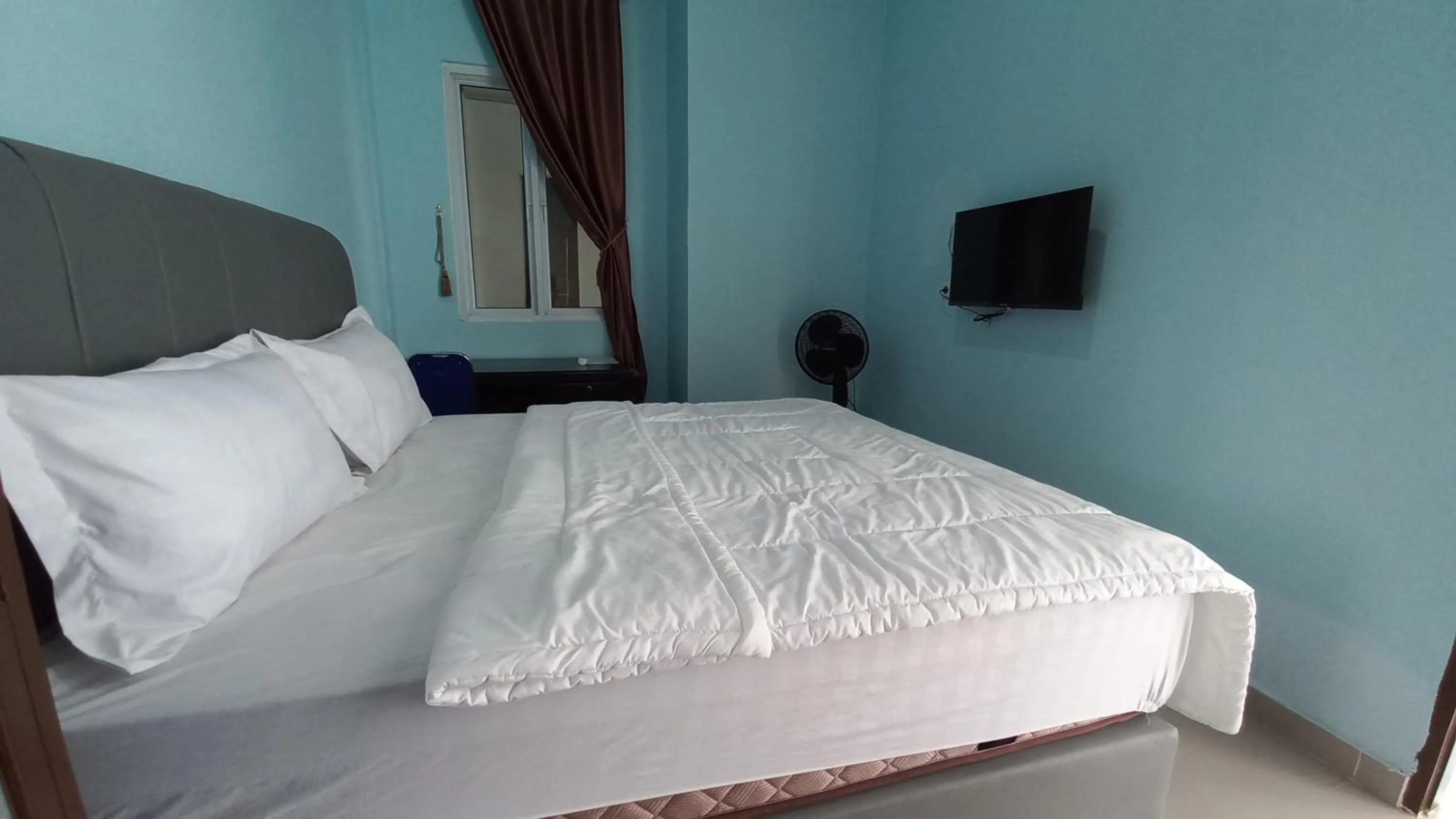 Bedroom, Bed in Hotel O Pinus Jaya SyariahNearTaman Amaryllis Pekanbaru