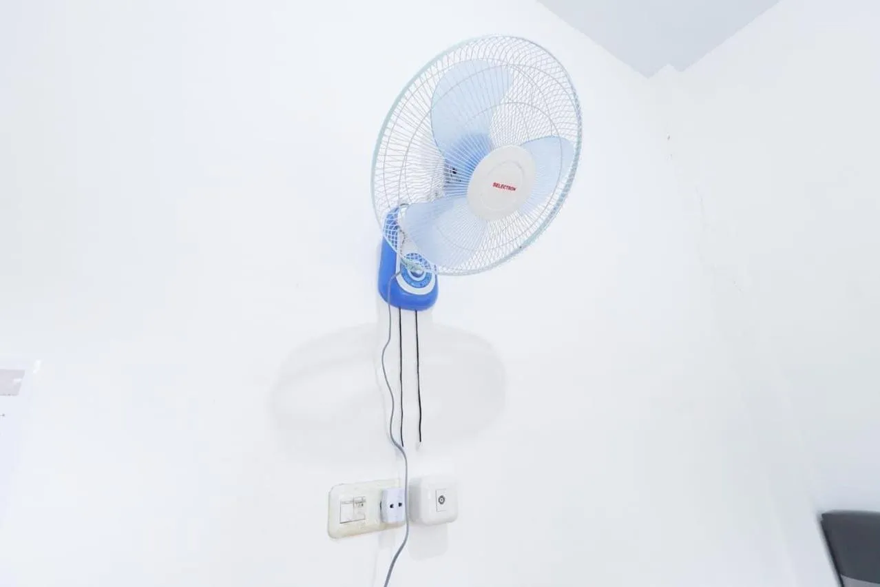 Bedroom in SPOT ON 93442 Widya Homestay SyariahNearBandara Sultan Syarif Kasim II