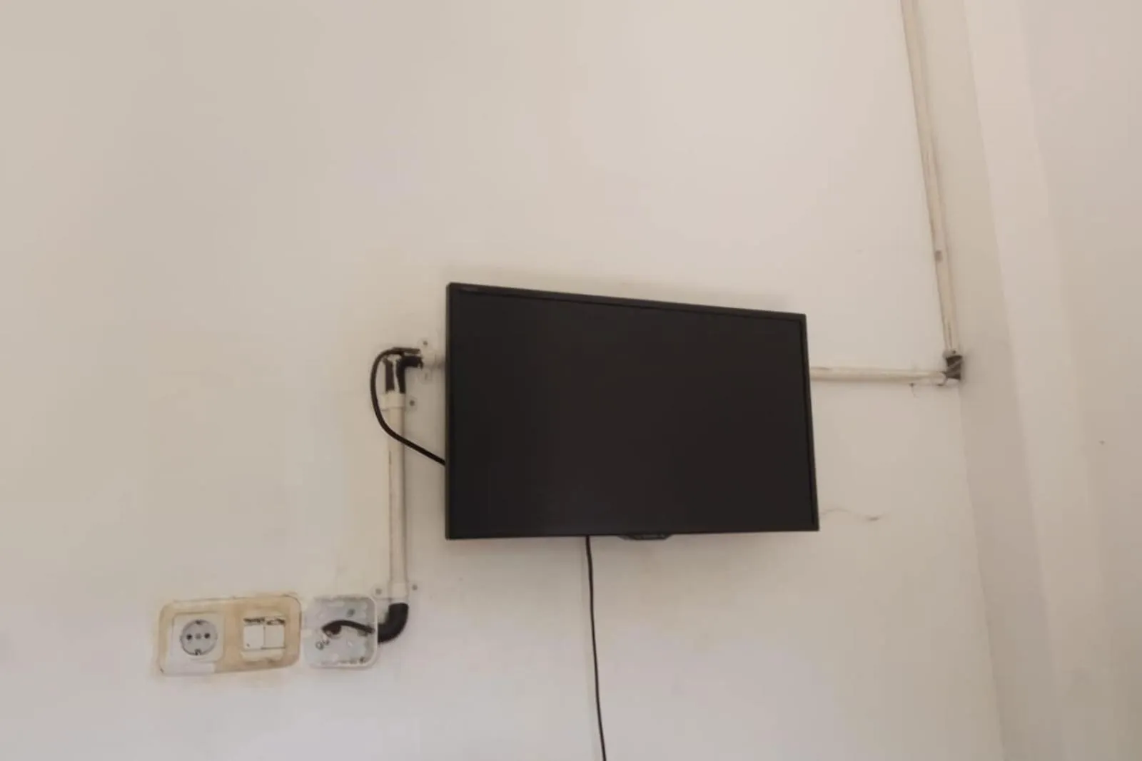 Bedroom in SPOT ON 93442 Widya Homestay SyariahNearBandara Sultan Syarif Kasim II