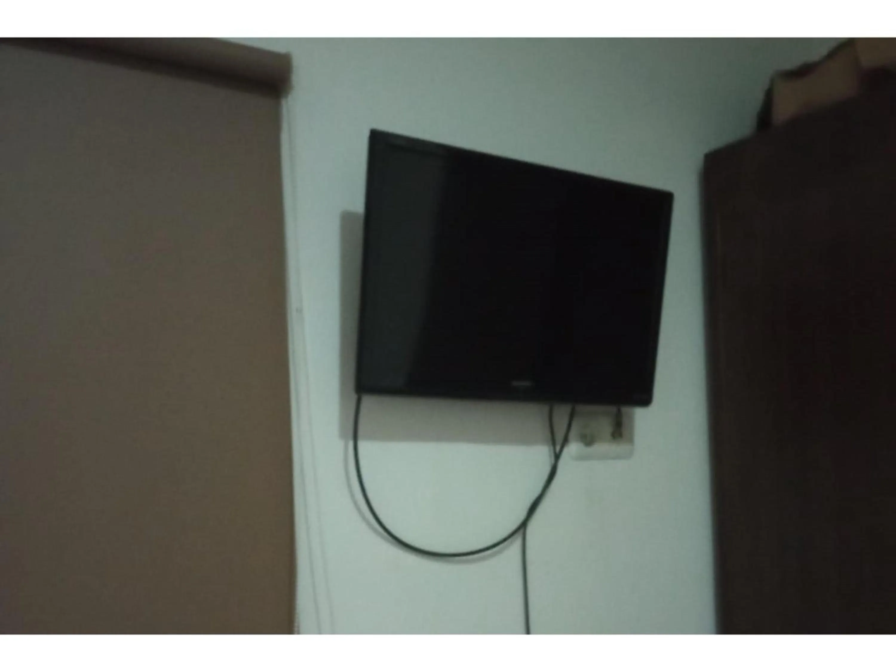 TV and multimedia in Hotel O White House SyariahNearOYO 93457 White House Syariah