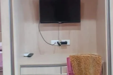 Bedroom in Hotel O White House SyariahNearOYO 93457 White House Syariah