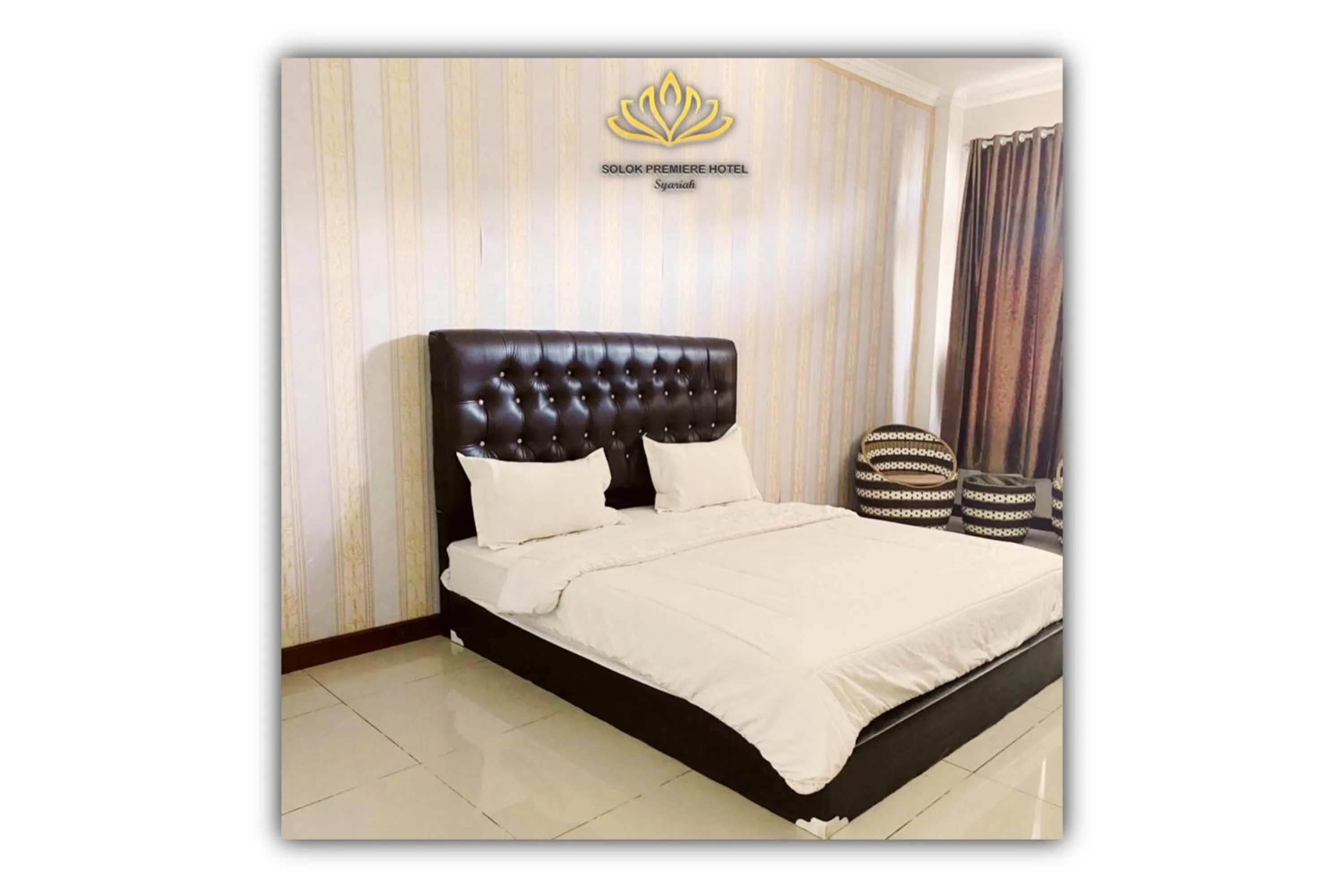 Bed in Solok Premier Hotel