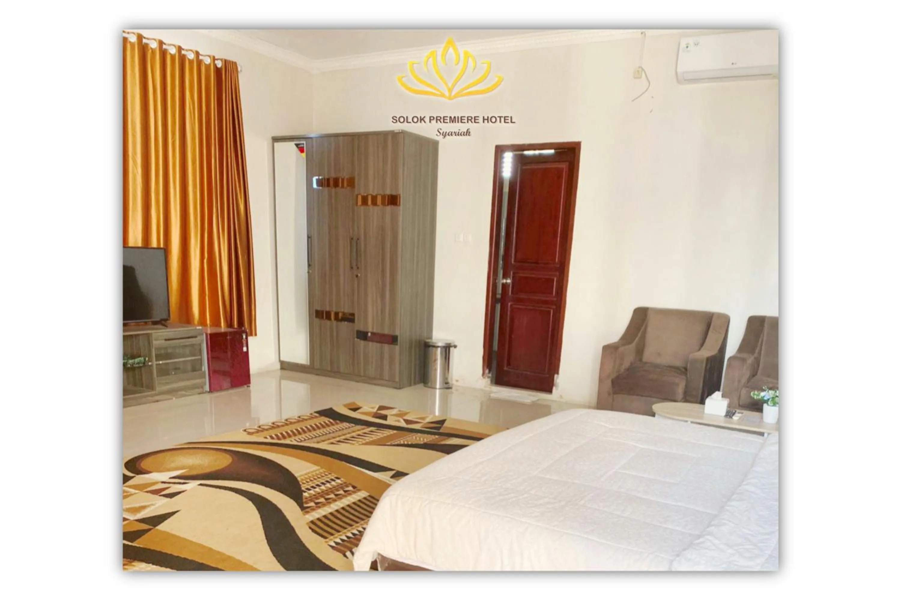 Bed in Solok Premier Hotel