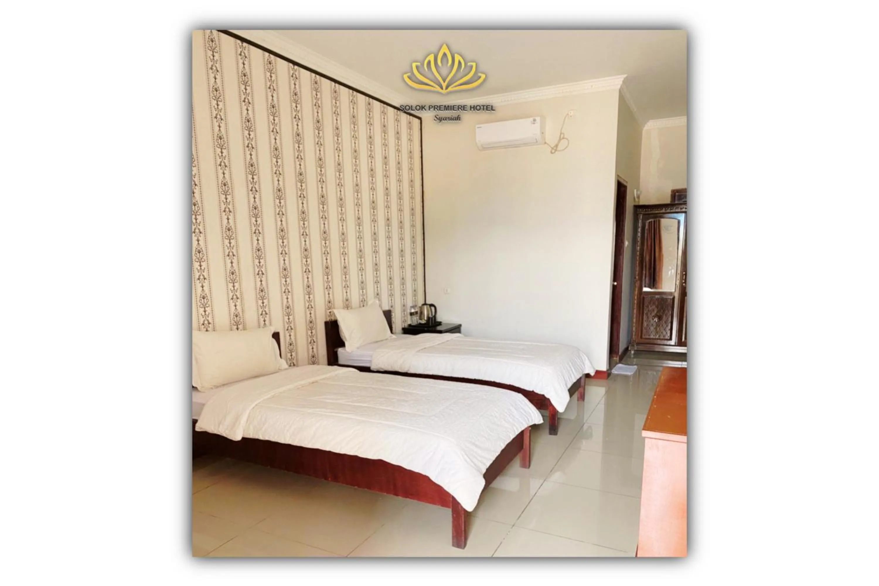 Bed in Solok Premier Hotel