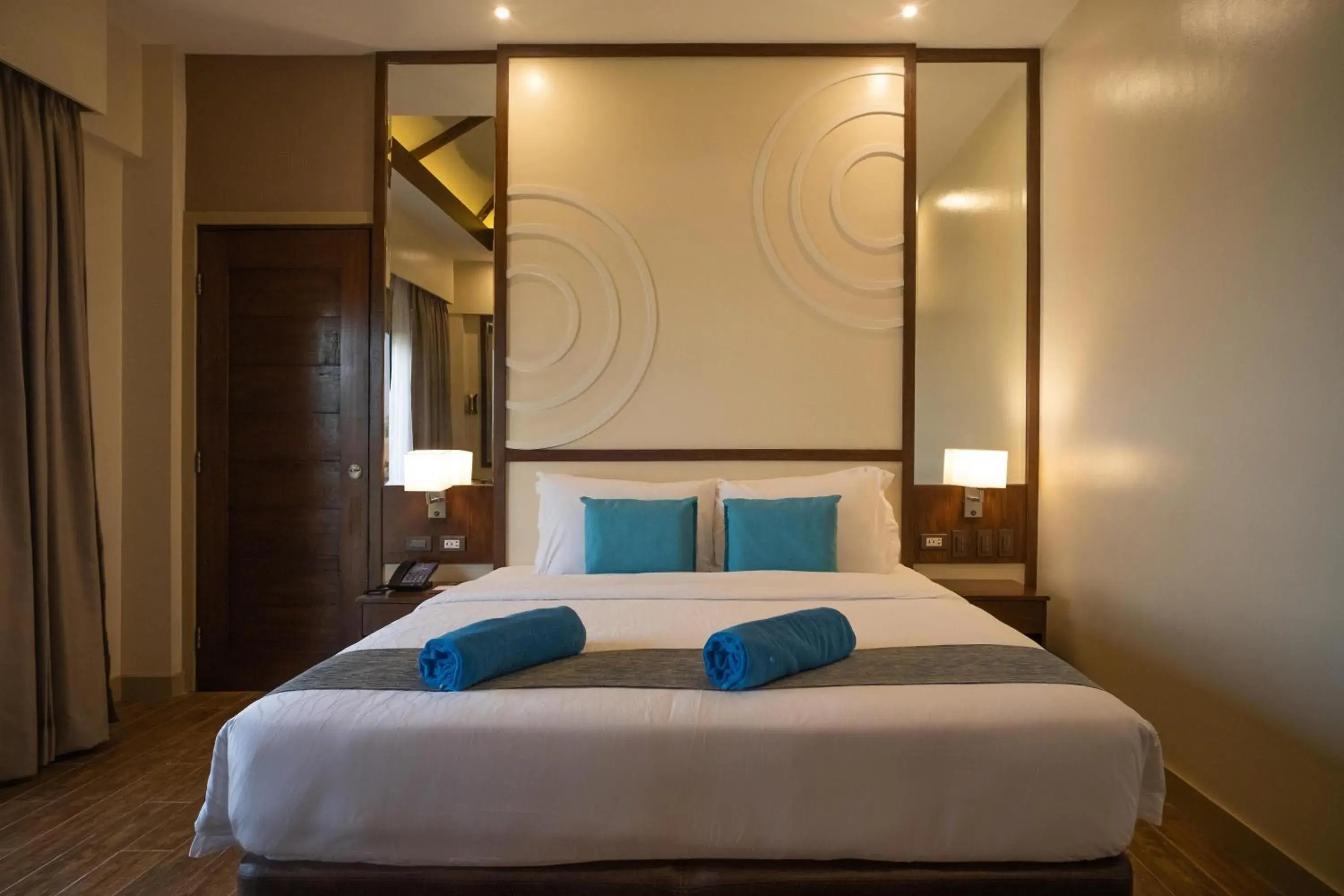 Bed in Parklane Bohol Resort and Spa Bed in Parklane Bohol Resort and Spa