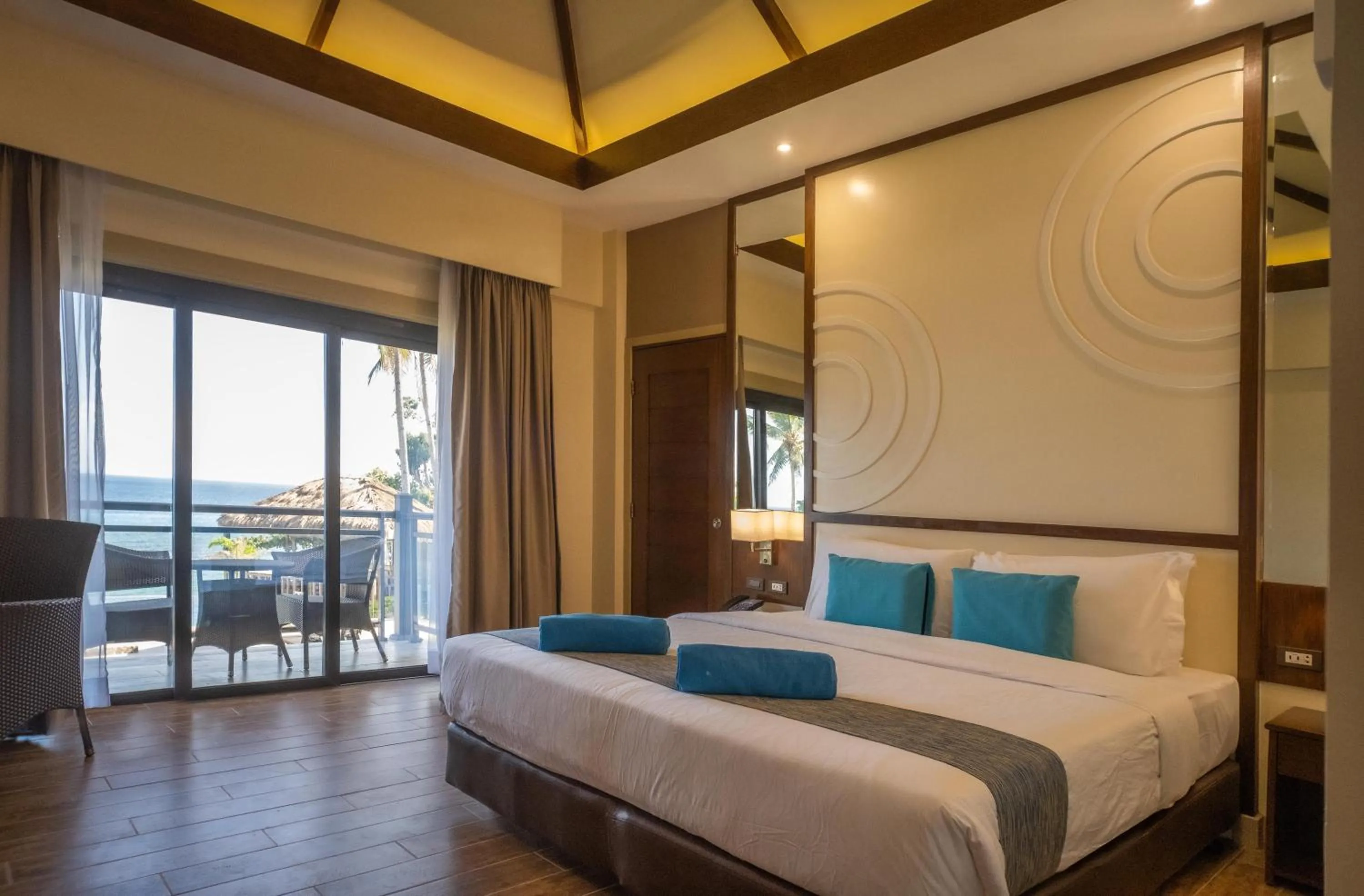 Bed in Parklane Bohol Resort and Spa