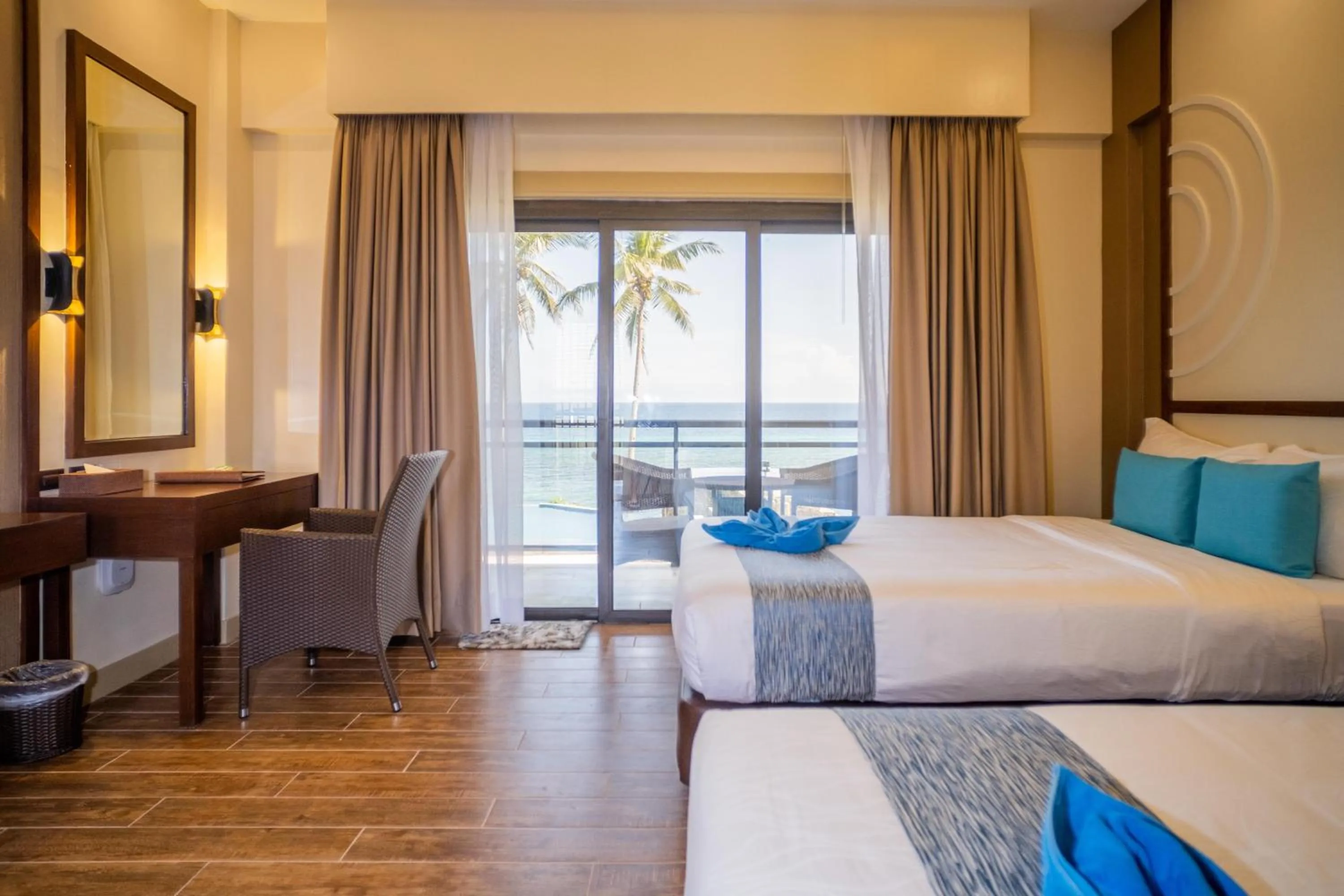 Bed in Parklane Bohol Resort and Spa