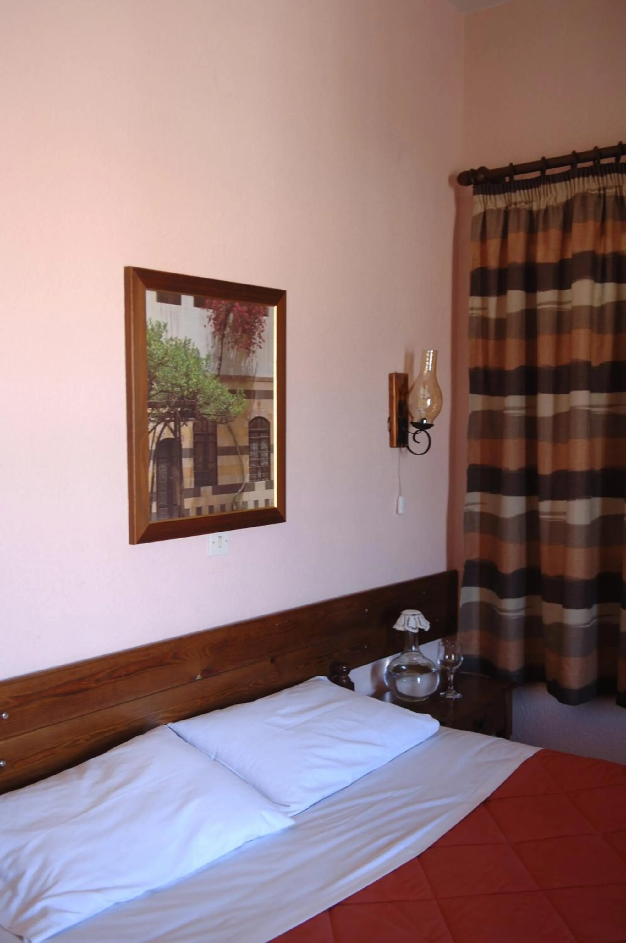 Bed in Rigas Hotel Arachova