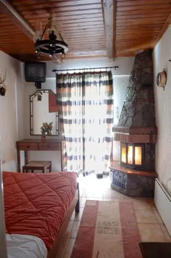 Bed in Rigas Hotel Arachova Bed in Rigas Hotel Arachova