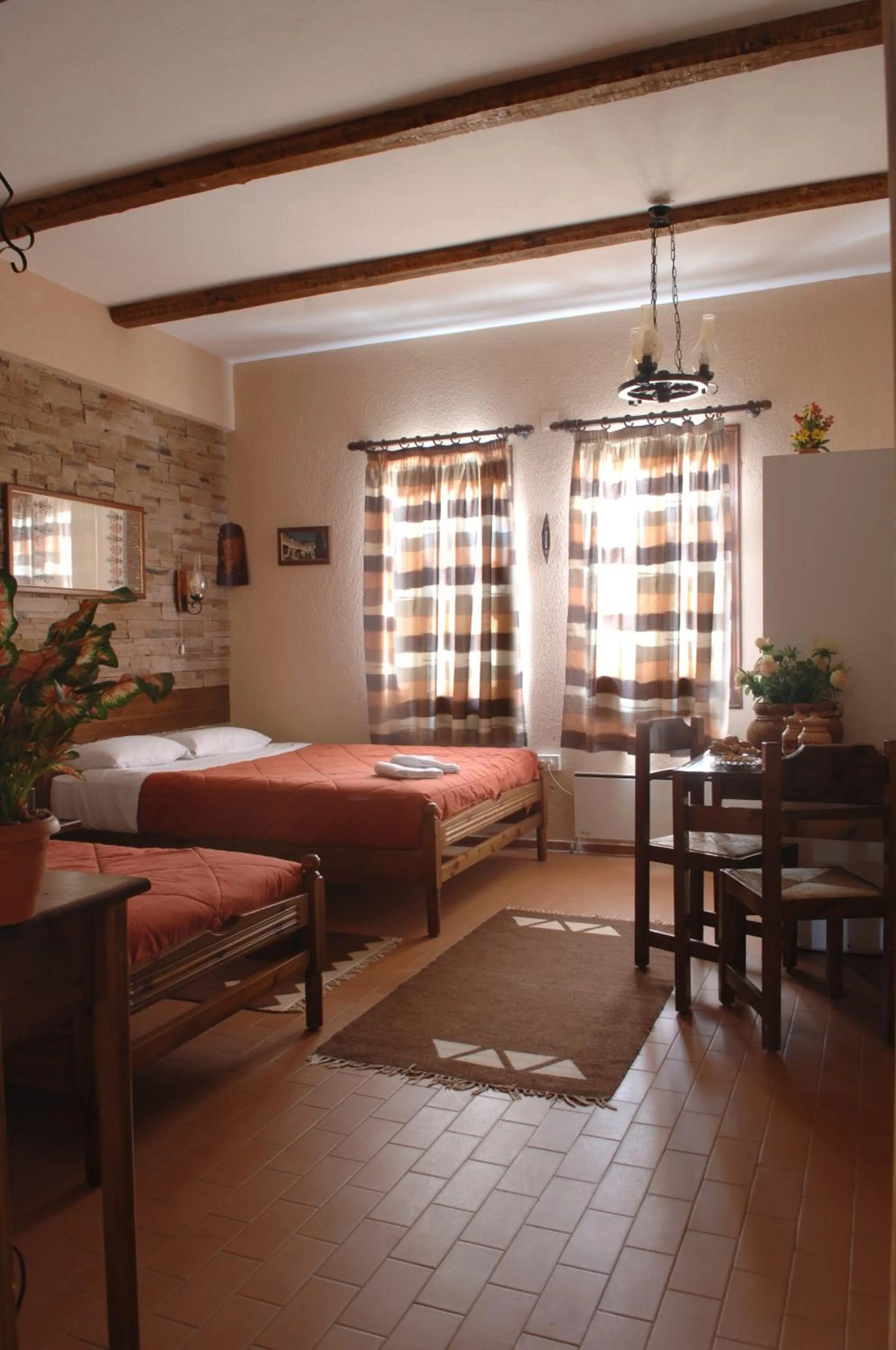 Bed in Rigas Hotel Arachova
