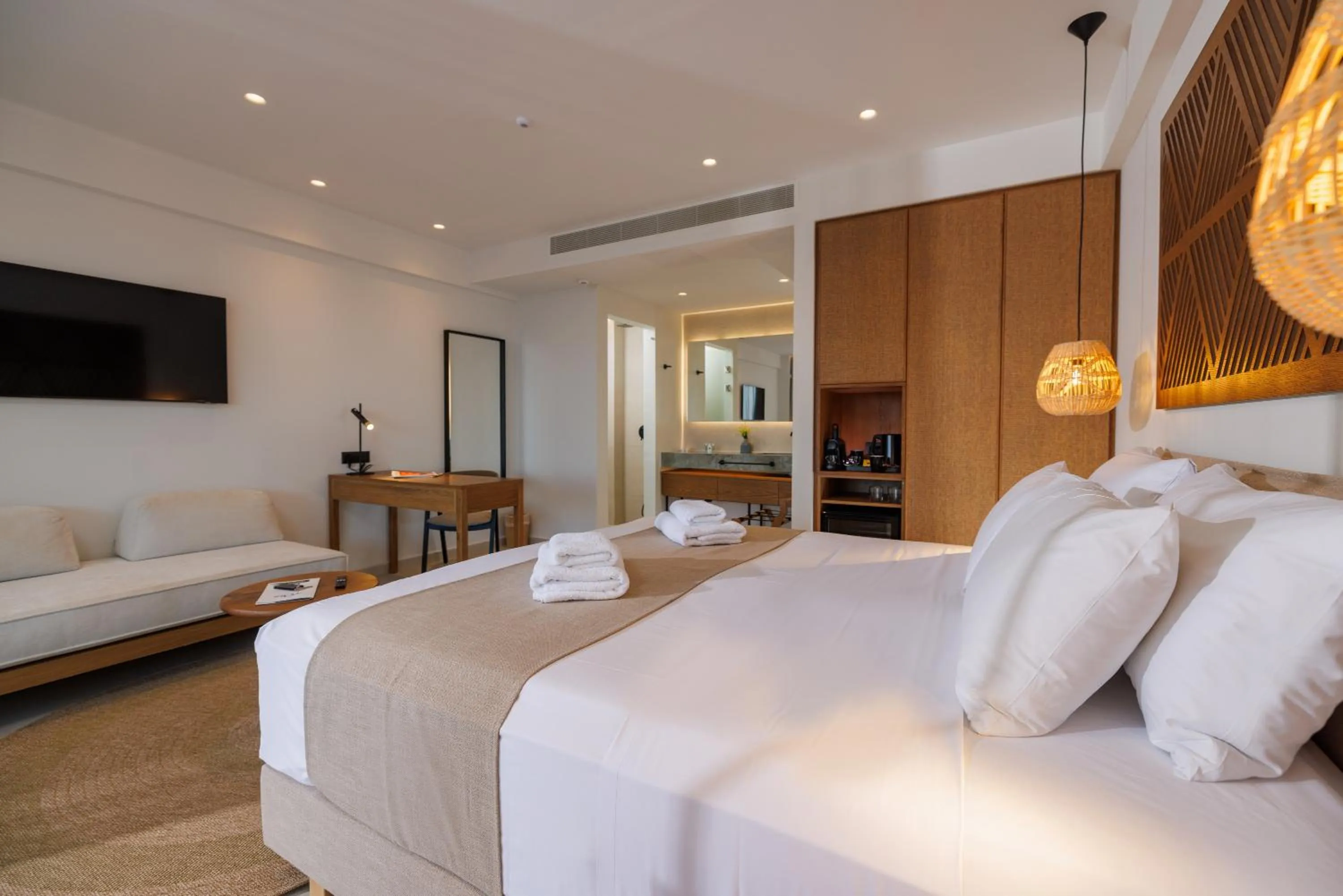 Bed in Deos Luxury Suites - Adults Only