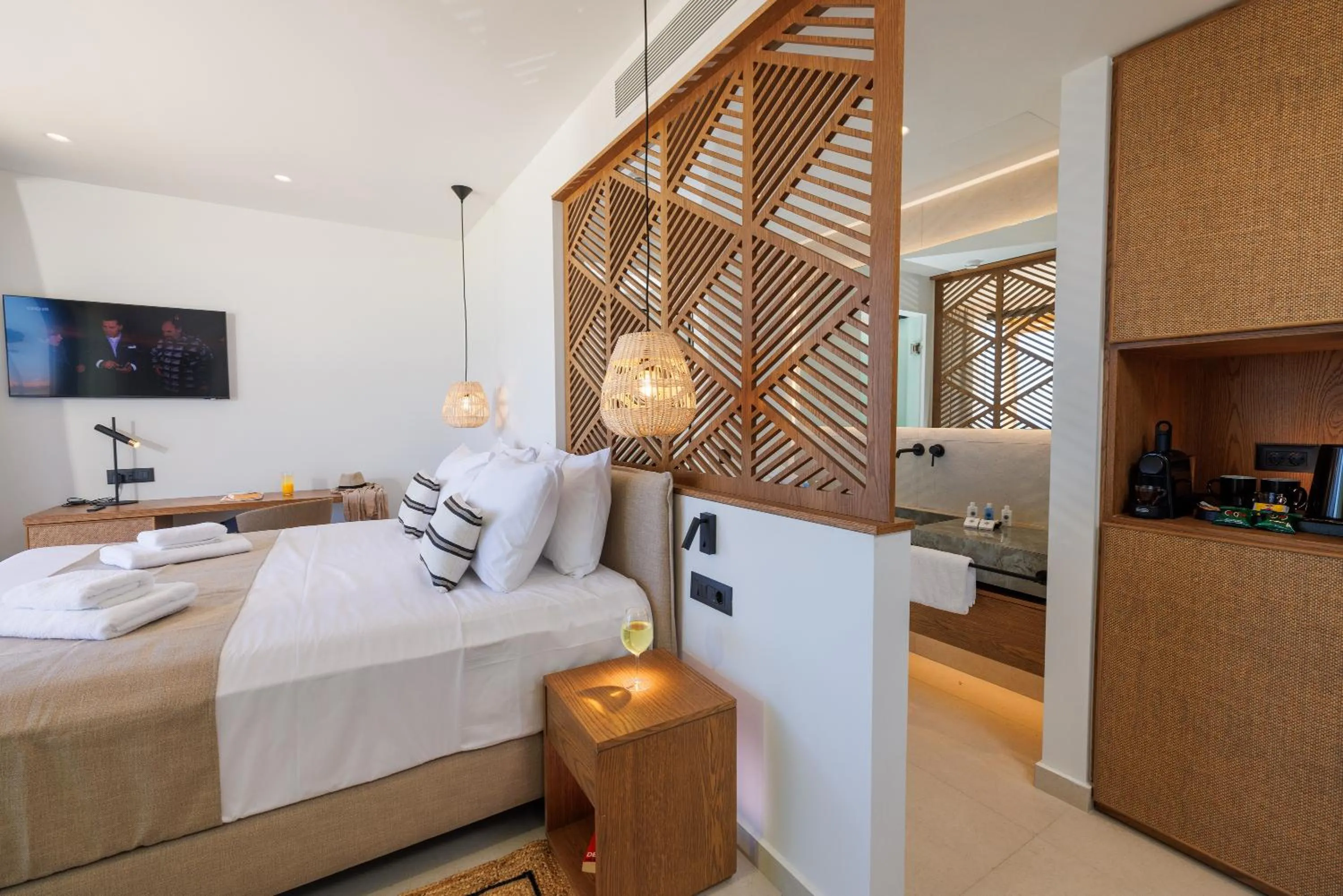 Bed in Deos Luxury Suites - Adults Only