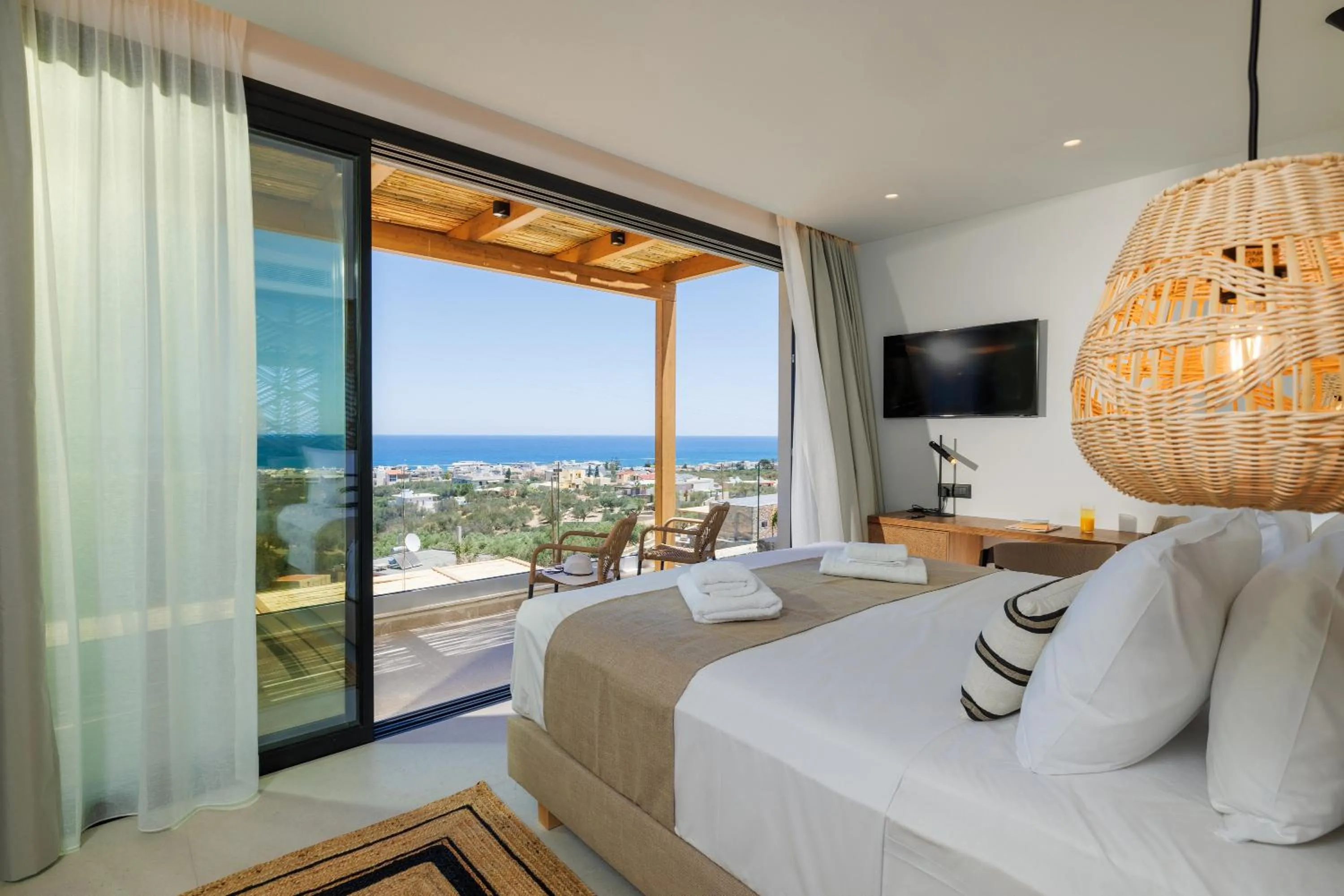 Bed in Deos Luxury Suites - Adults Only