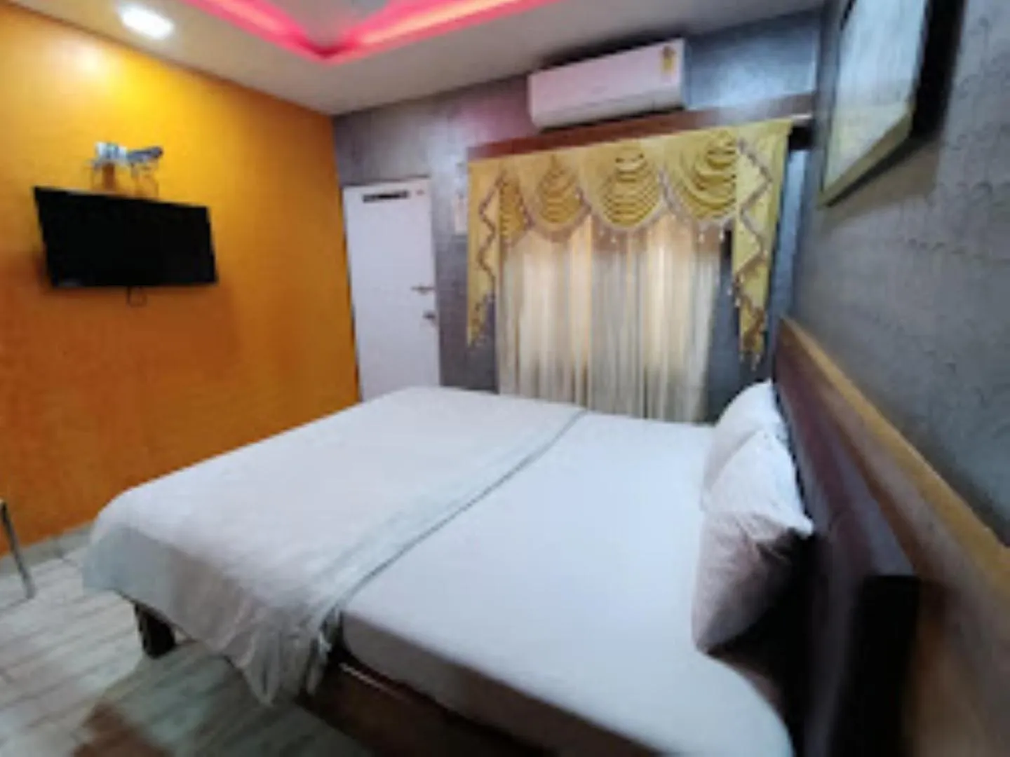 Bed, TV/Entertainment Center in White Sand Resort Manori Mumbai