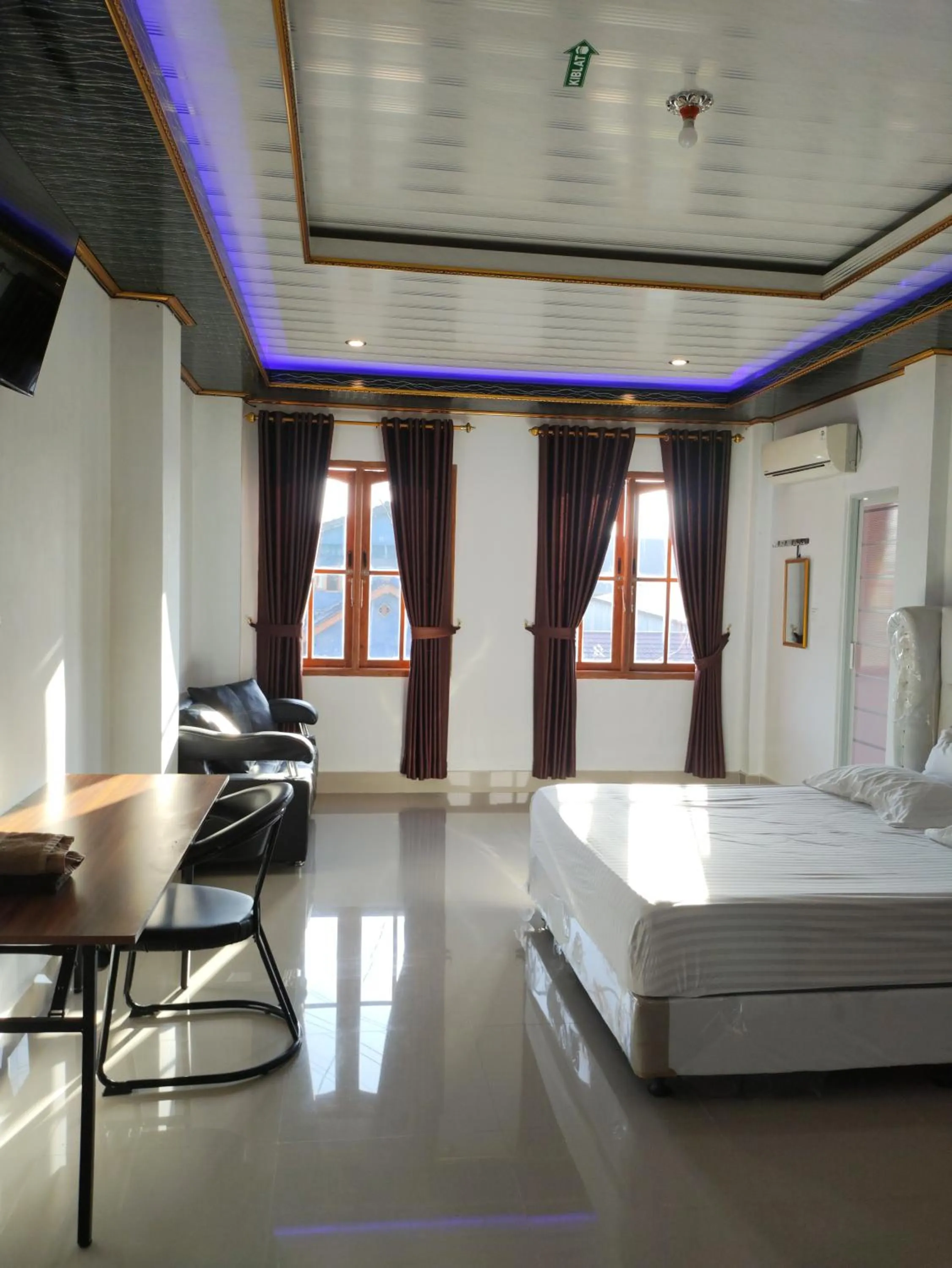 Bed in Penginapan Nurmega jaya