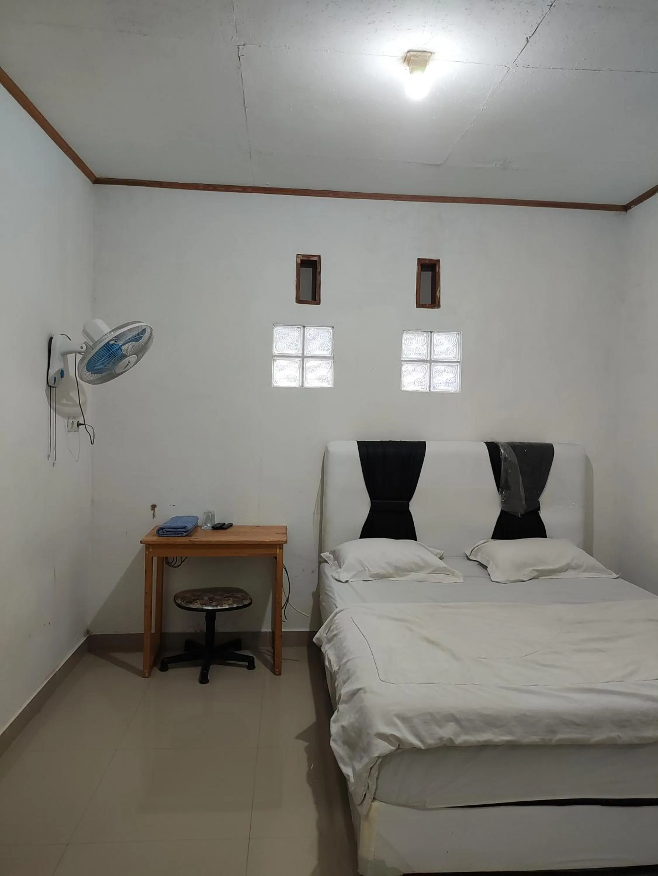 Bed in Penginapan Nurmega jaya