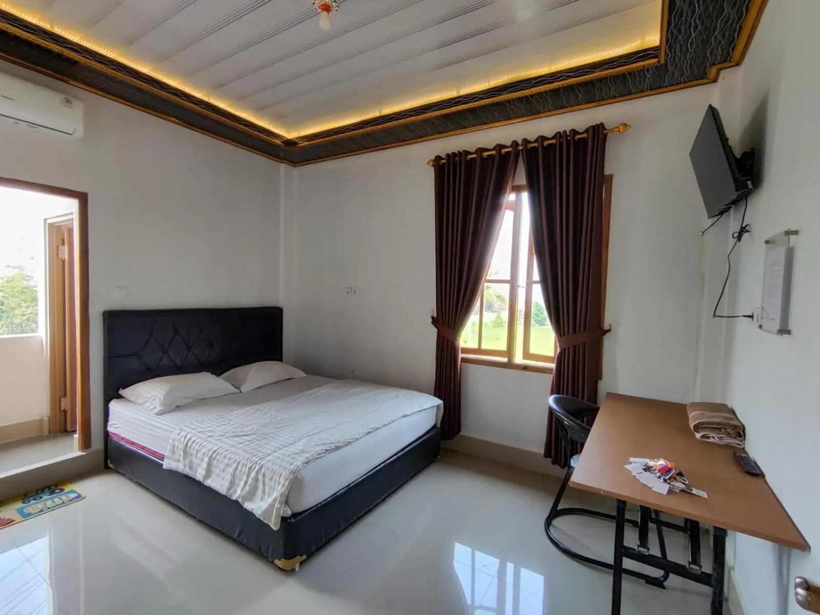 Bed in Penginapan Nurmega jaya