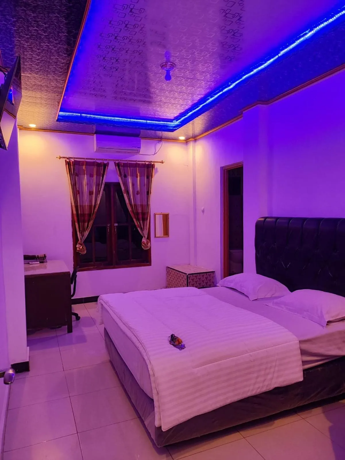 Bed in Penginapan Nurmega jaya