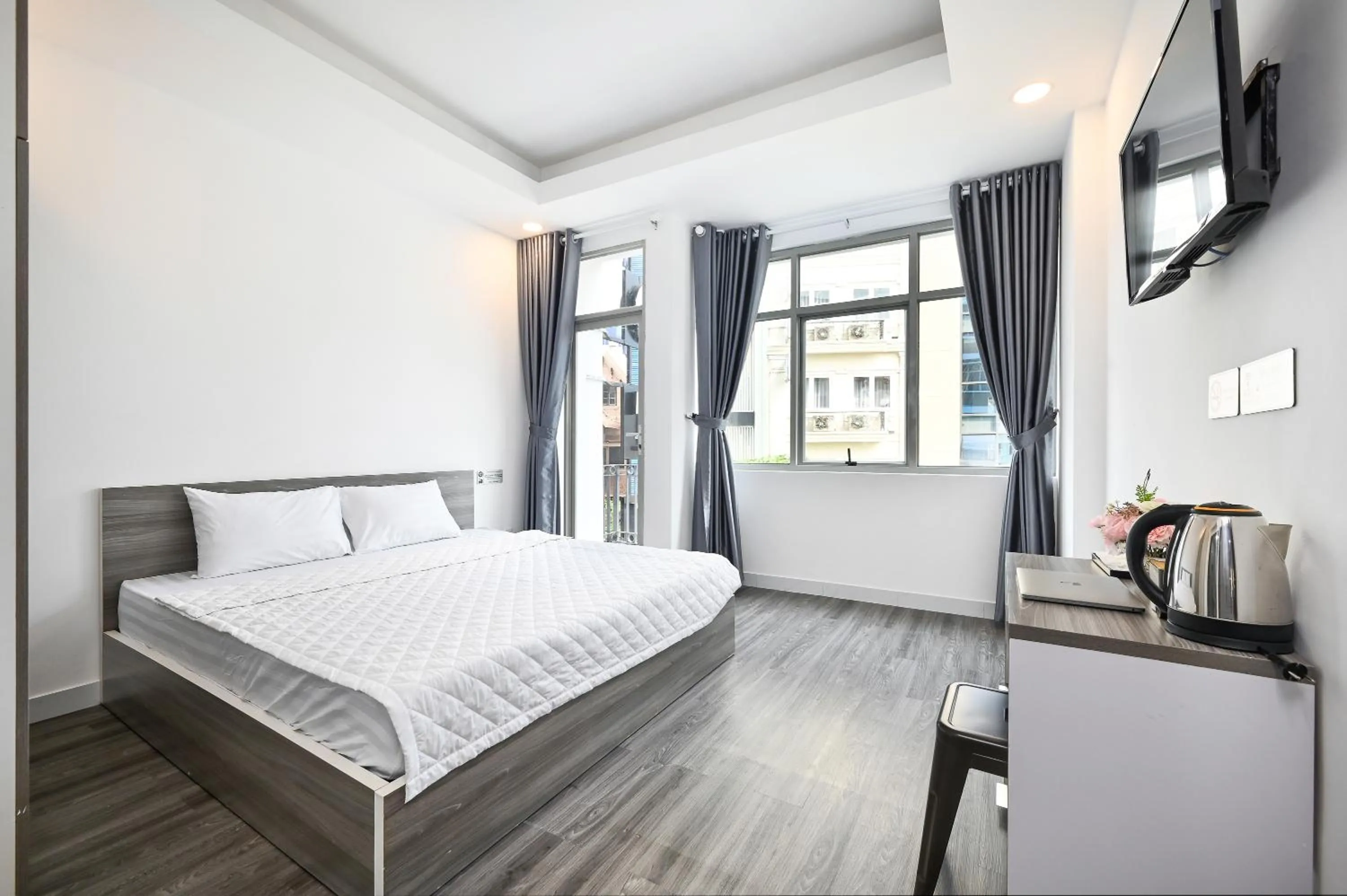 Photo of the whole room, Bed in YoKo Airport Saigon Hotel