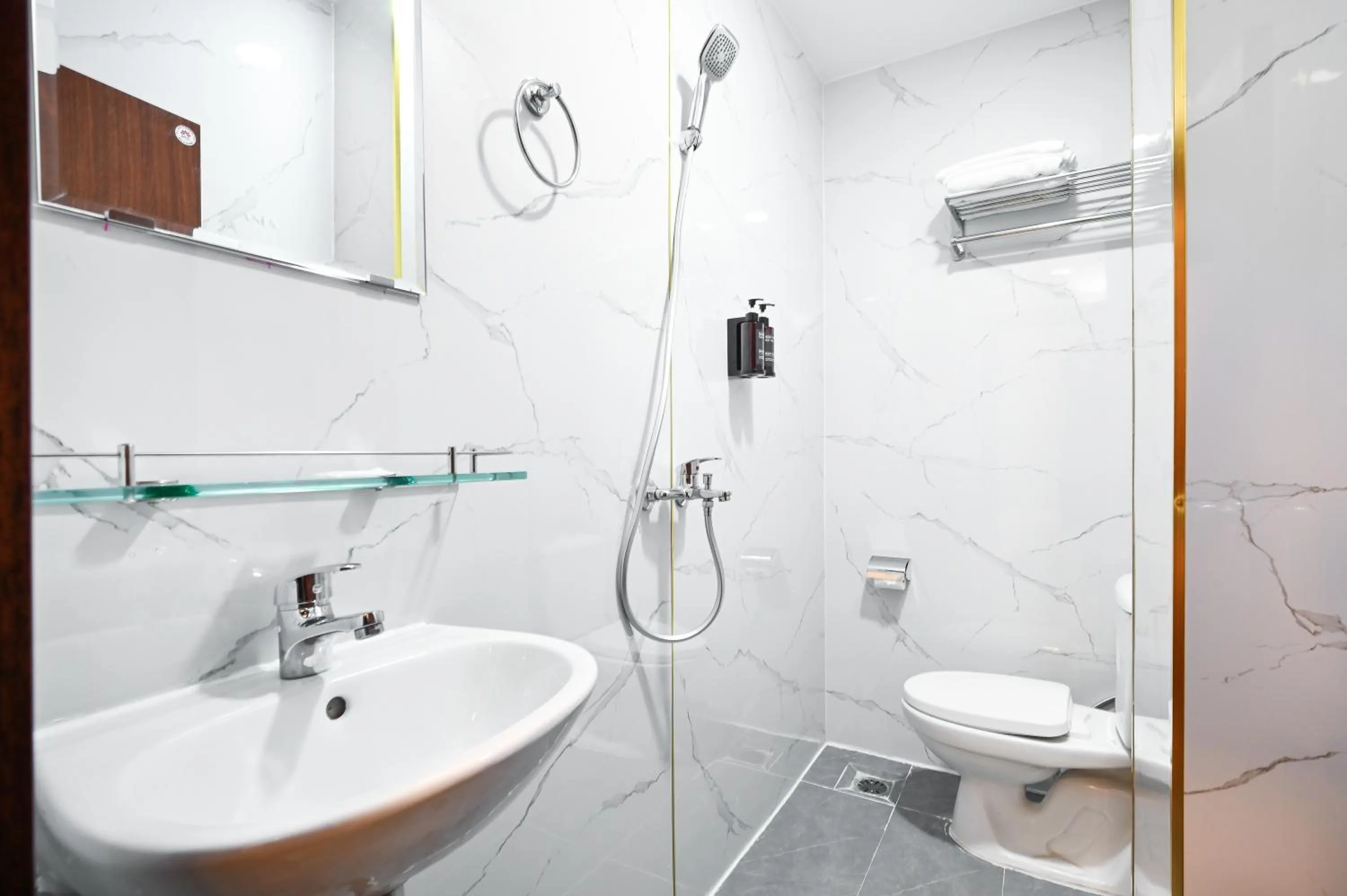 Shower in YoKo Airport Saigon Hotel