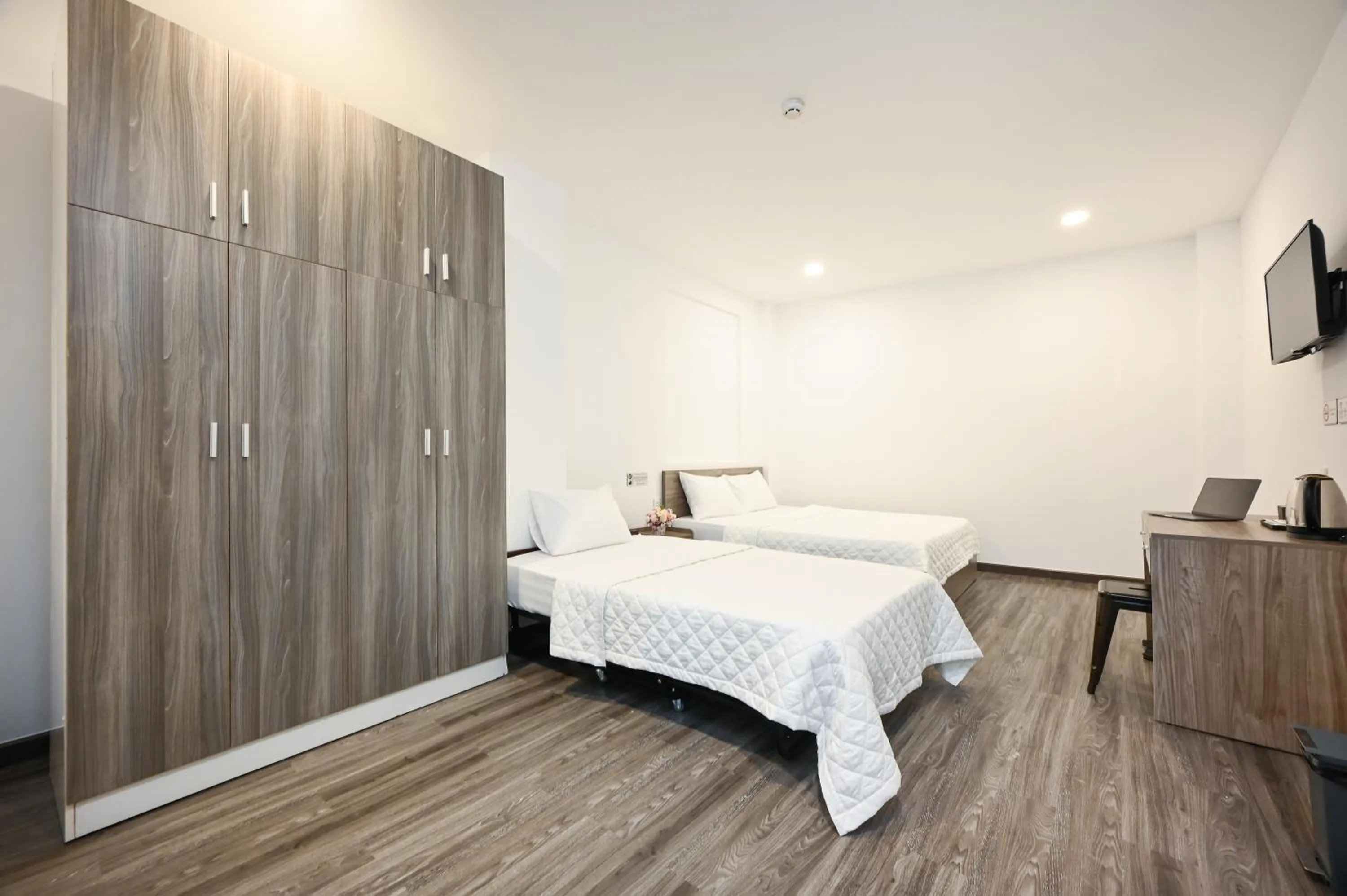 wardrobe, Bed in YoKo Airport Saigon Hotel