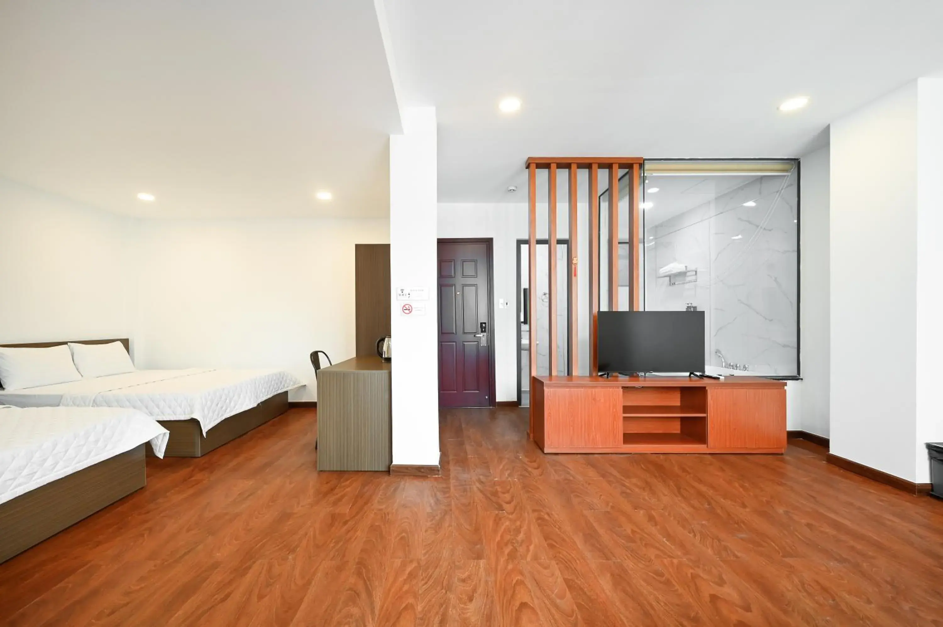 Photo of the whole room, Bed in YoKo Airport Saigon Hotel Photo of the whole room, Bed in YoKo Airport Saigon Hotel