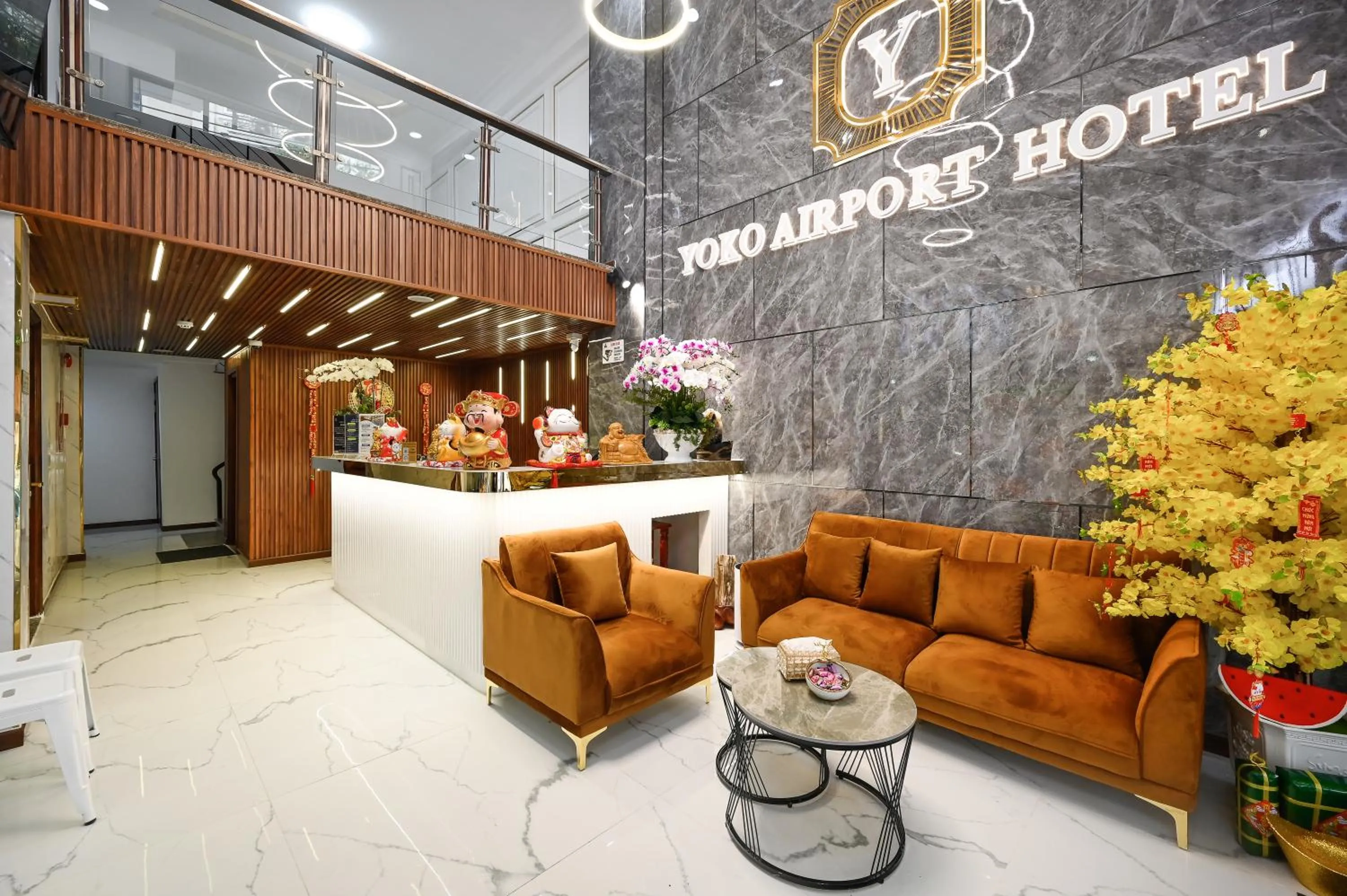 Seating area in YoKo Airport Saigon Hotel