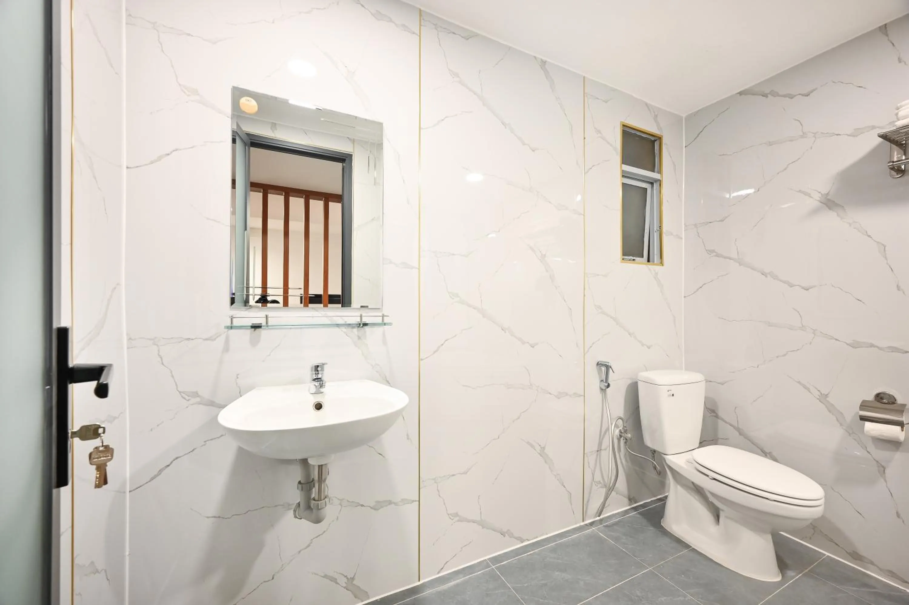 Toilet in YoKo Airport Saigon Hotel