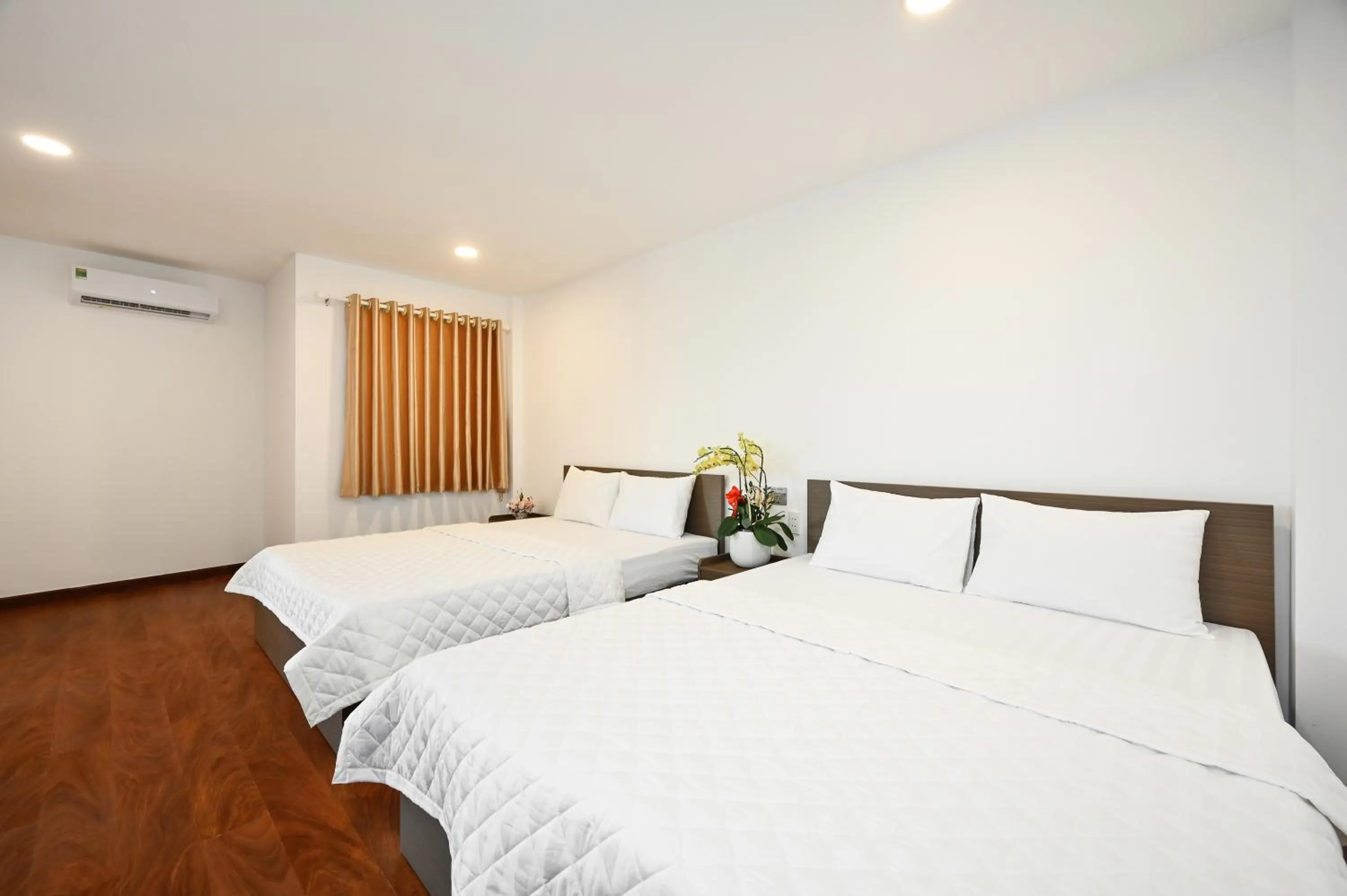 Bed in YoKo Airport Saigon Hotel