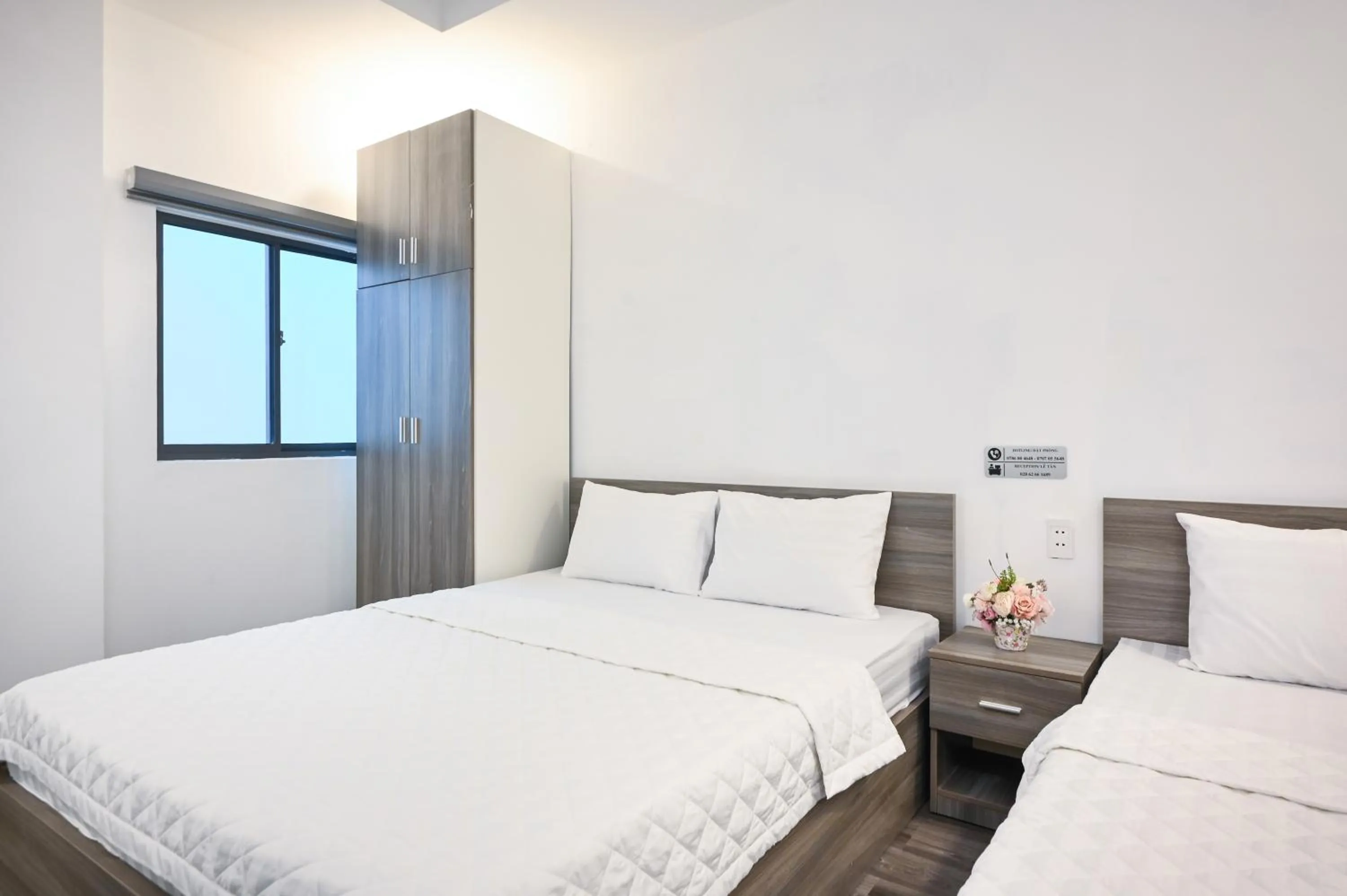 Bed in YoKo Airport Saigon Hotel