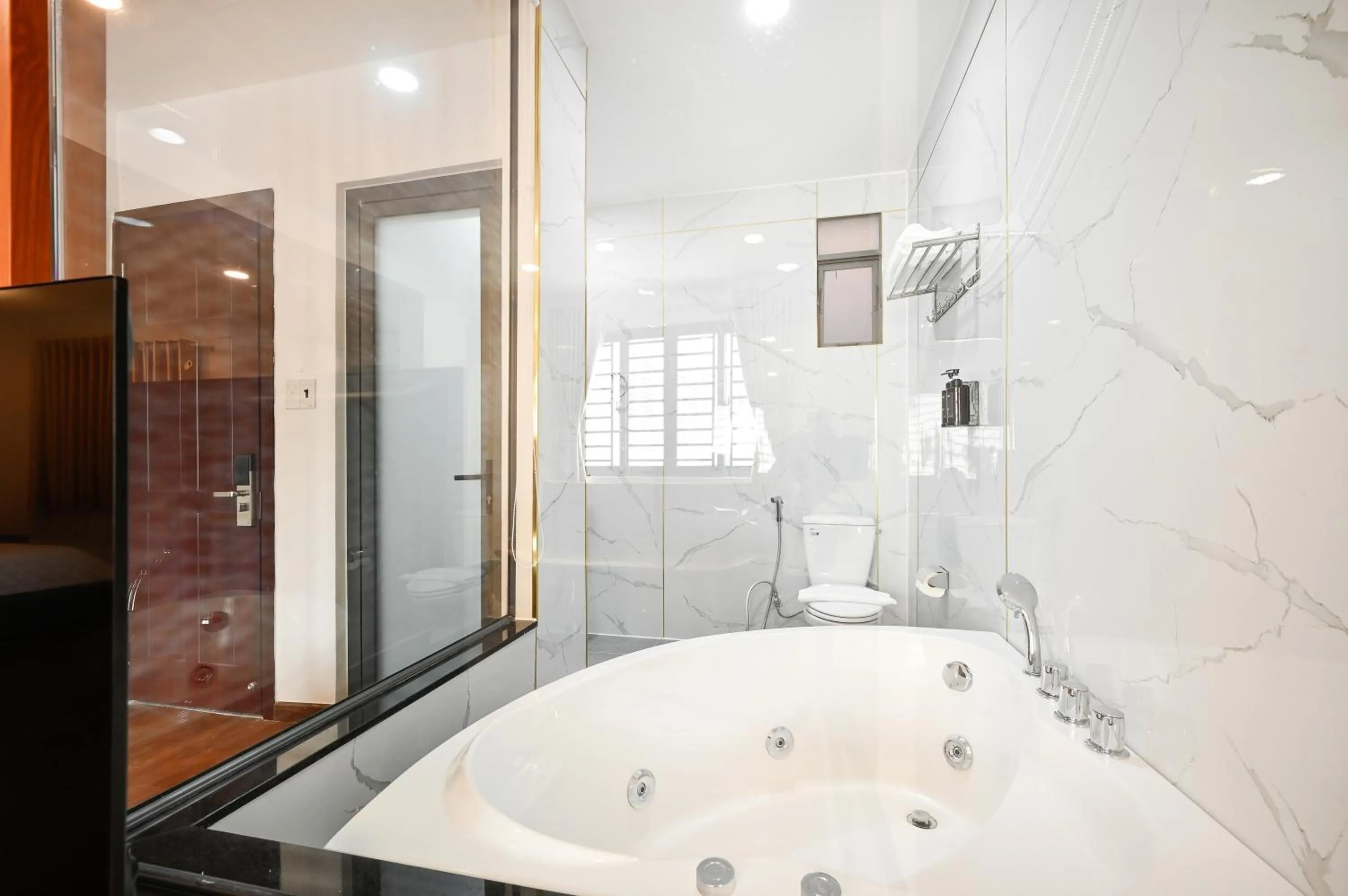 Shower in YoKo Airport Saigon Hotel