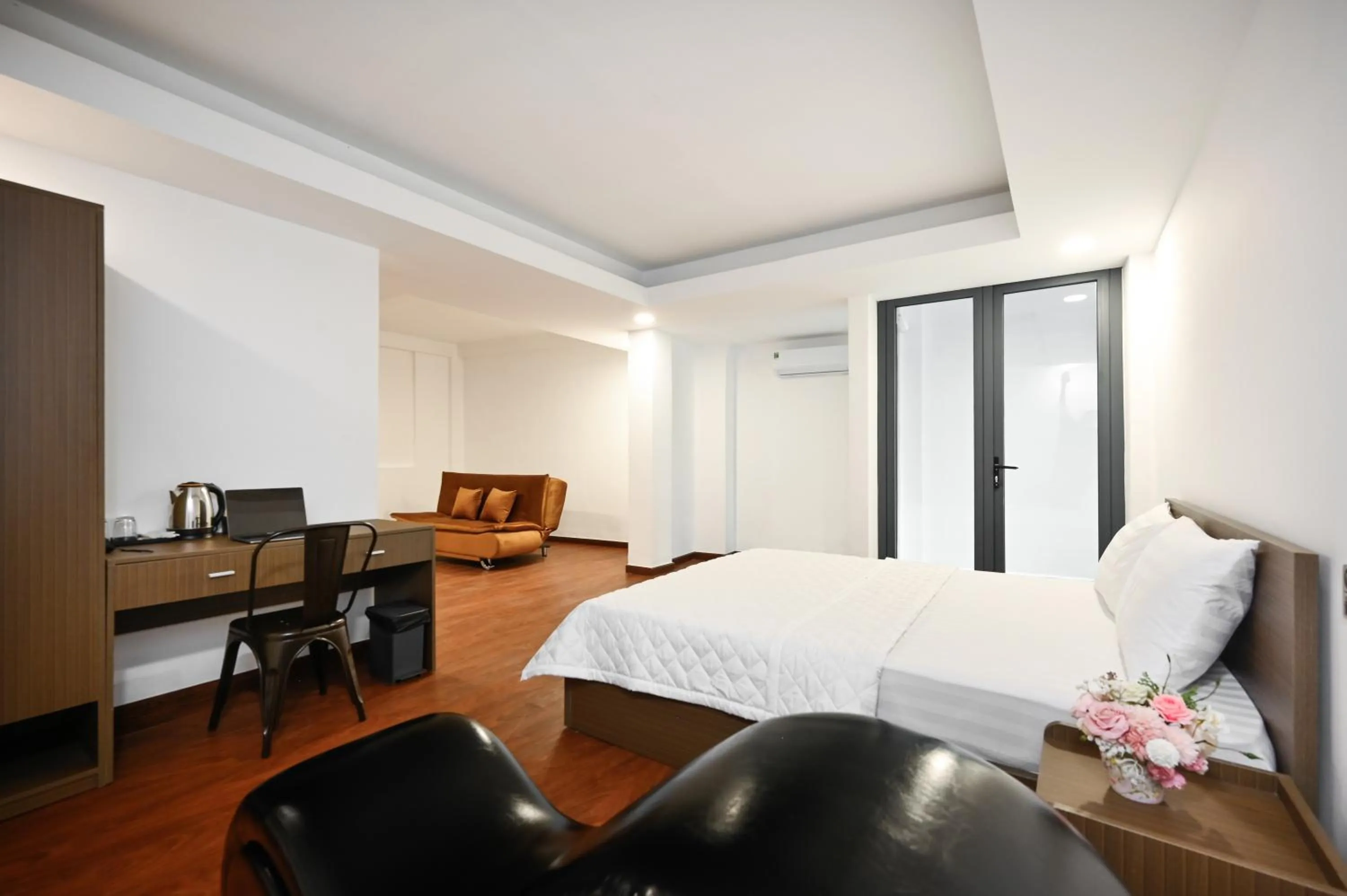 Bed in YoKo Airport Saigon Hotel