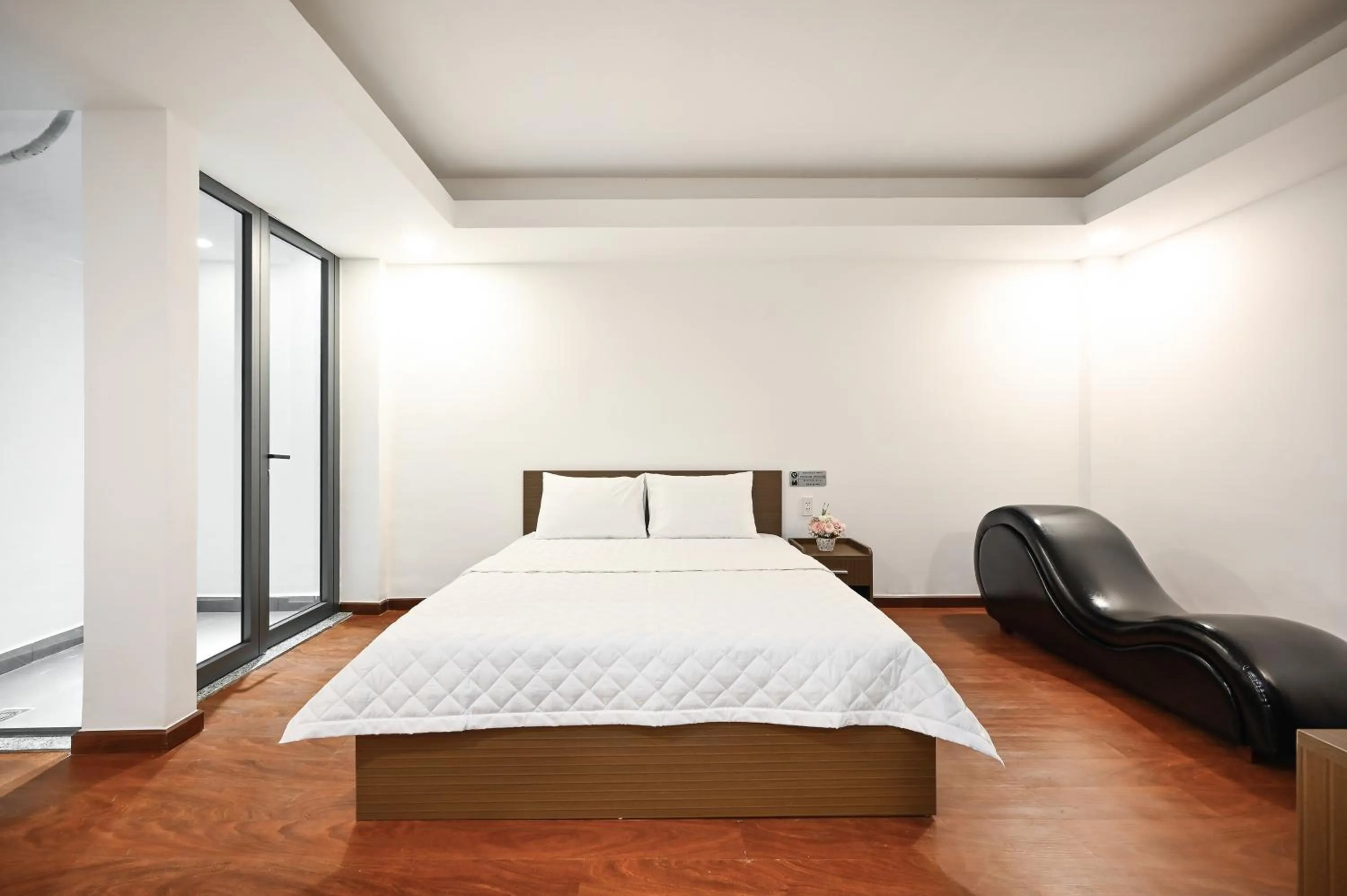 Bed in YoKo Airport Saigon Hotel